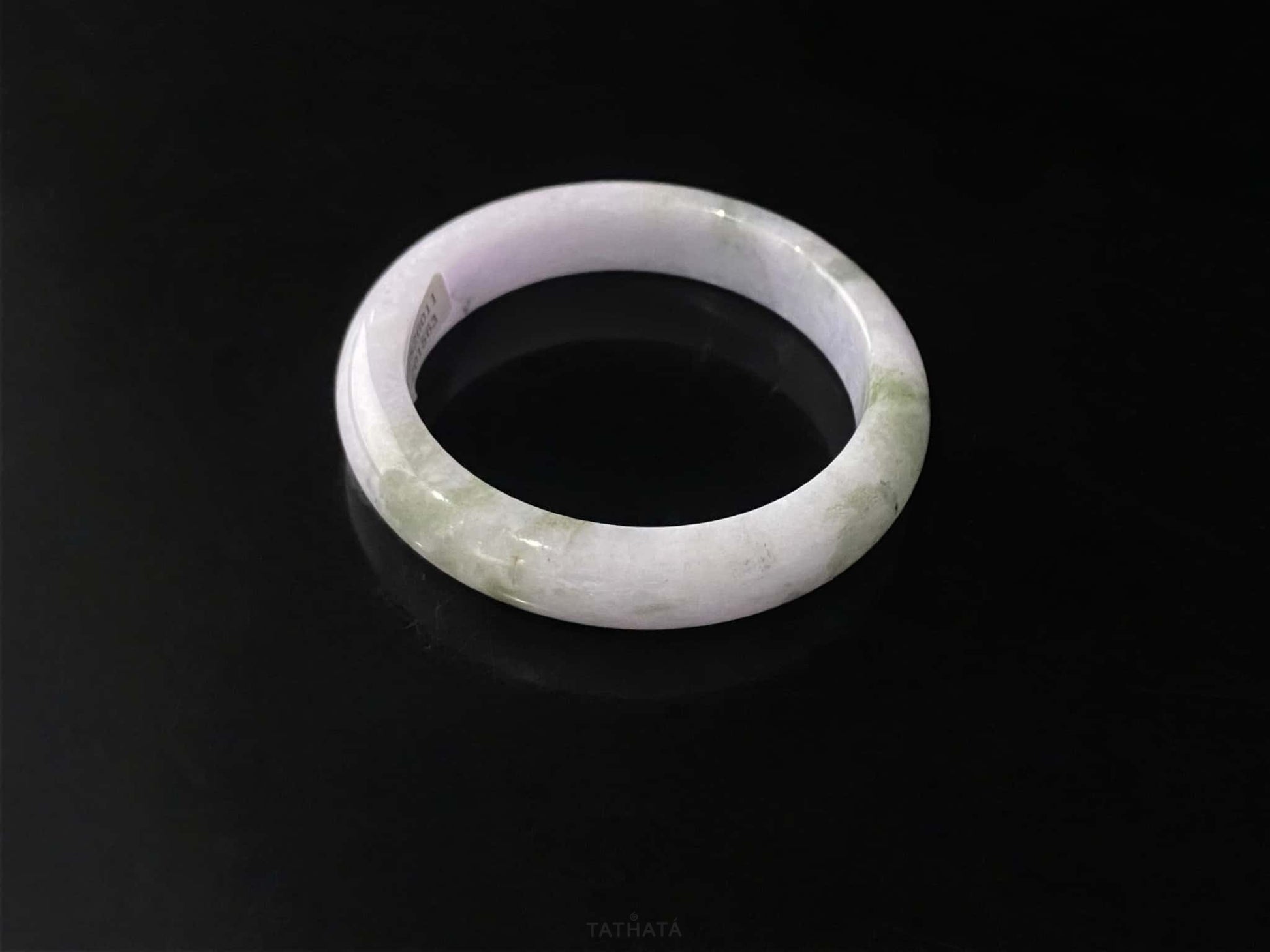 A violet cloud sprout jadeite bangle.