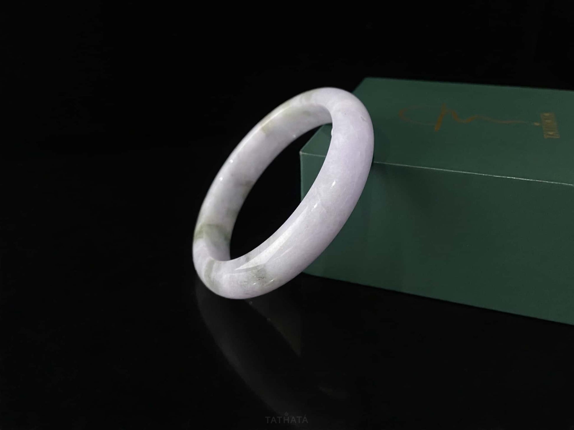 A violet cloud sprout jadeite bangle.
