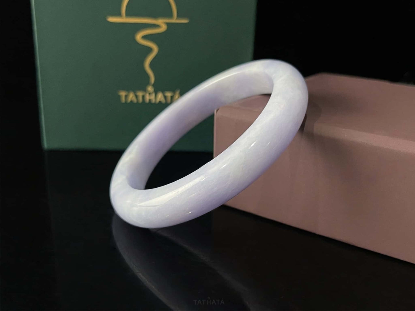 A lilac cloud veil jadeite bangle.
