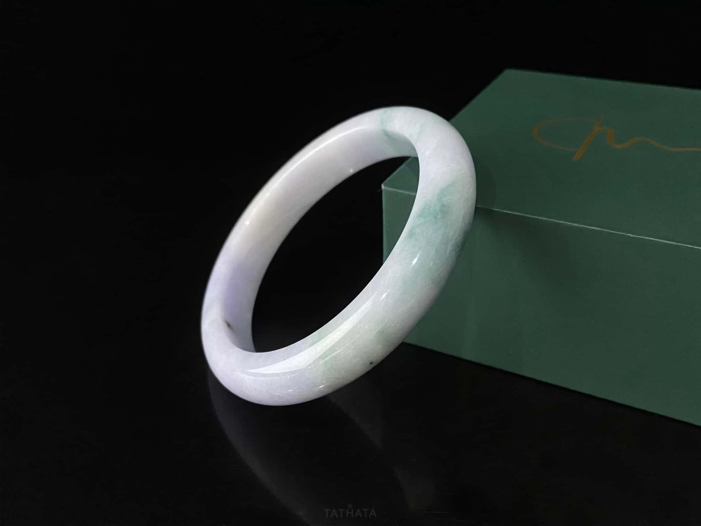 A lavender cloud Blue veil jadeite bangle.