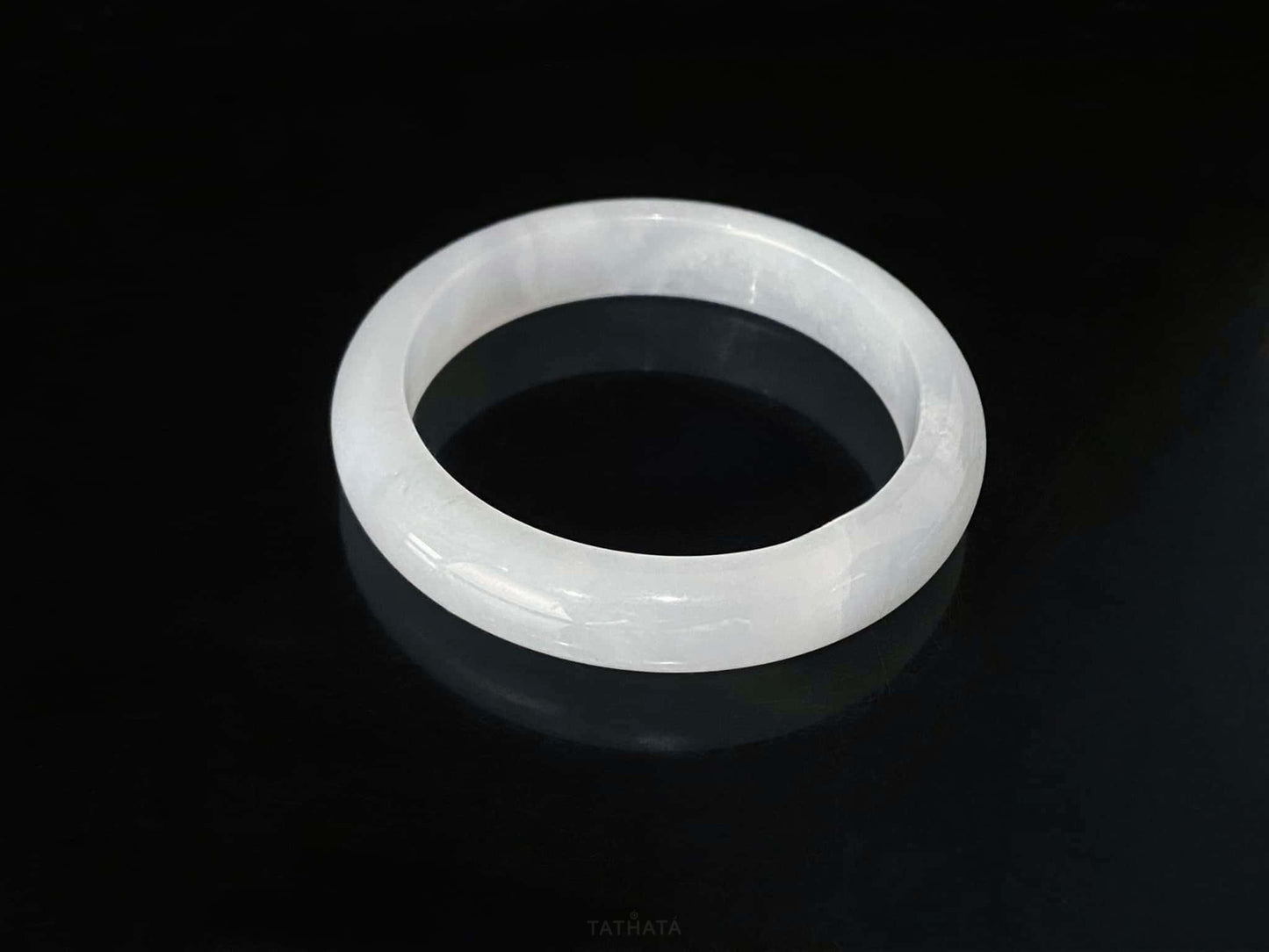 A milky white mist jadeite bangle.