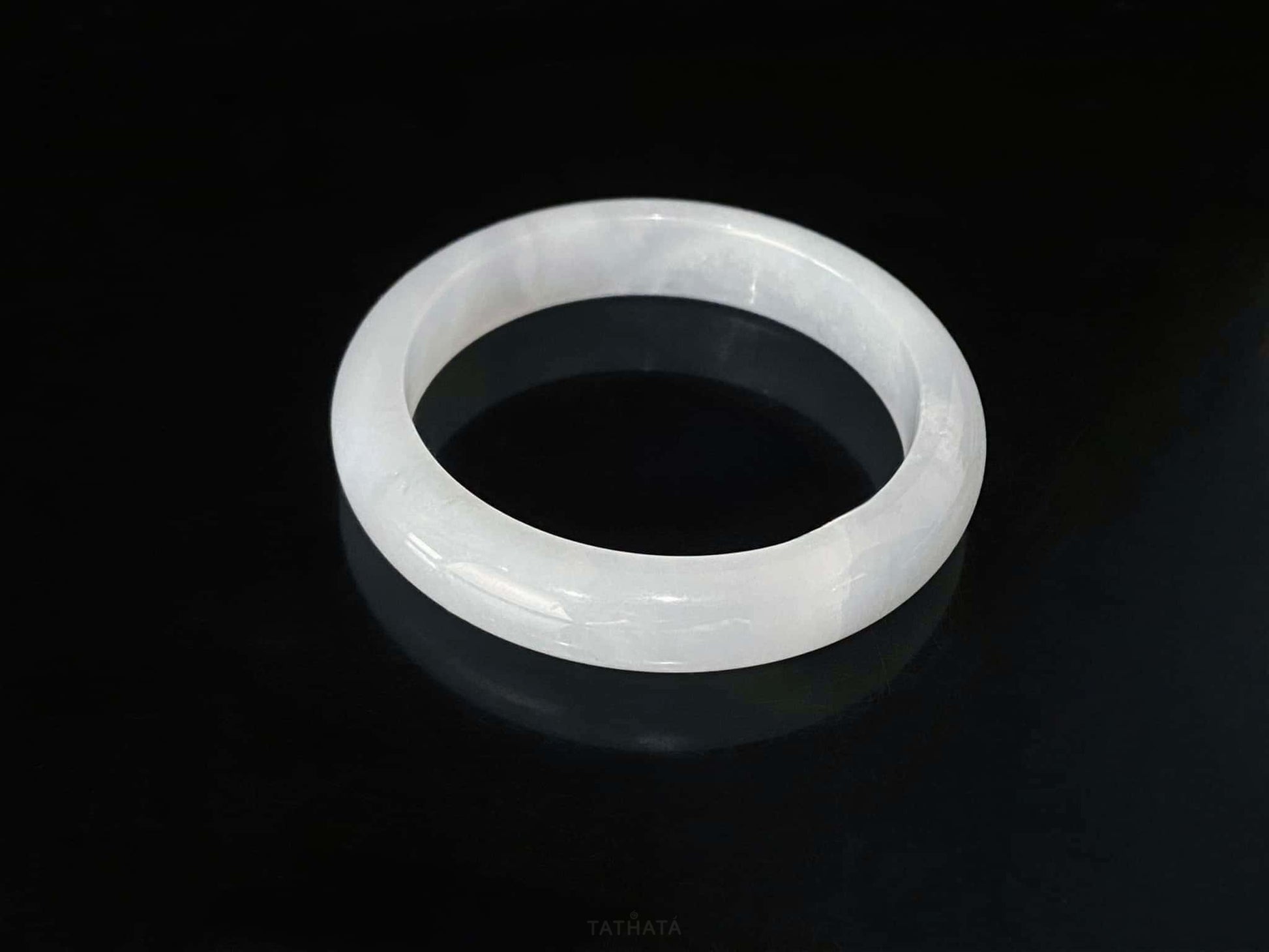 A milky white mist jadeite bangle.