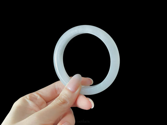A milky white mist jadeite bangle.