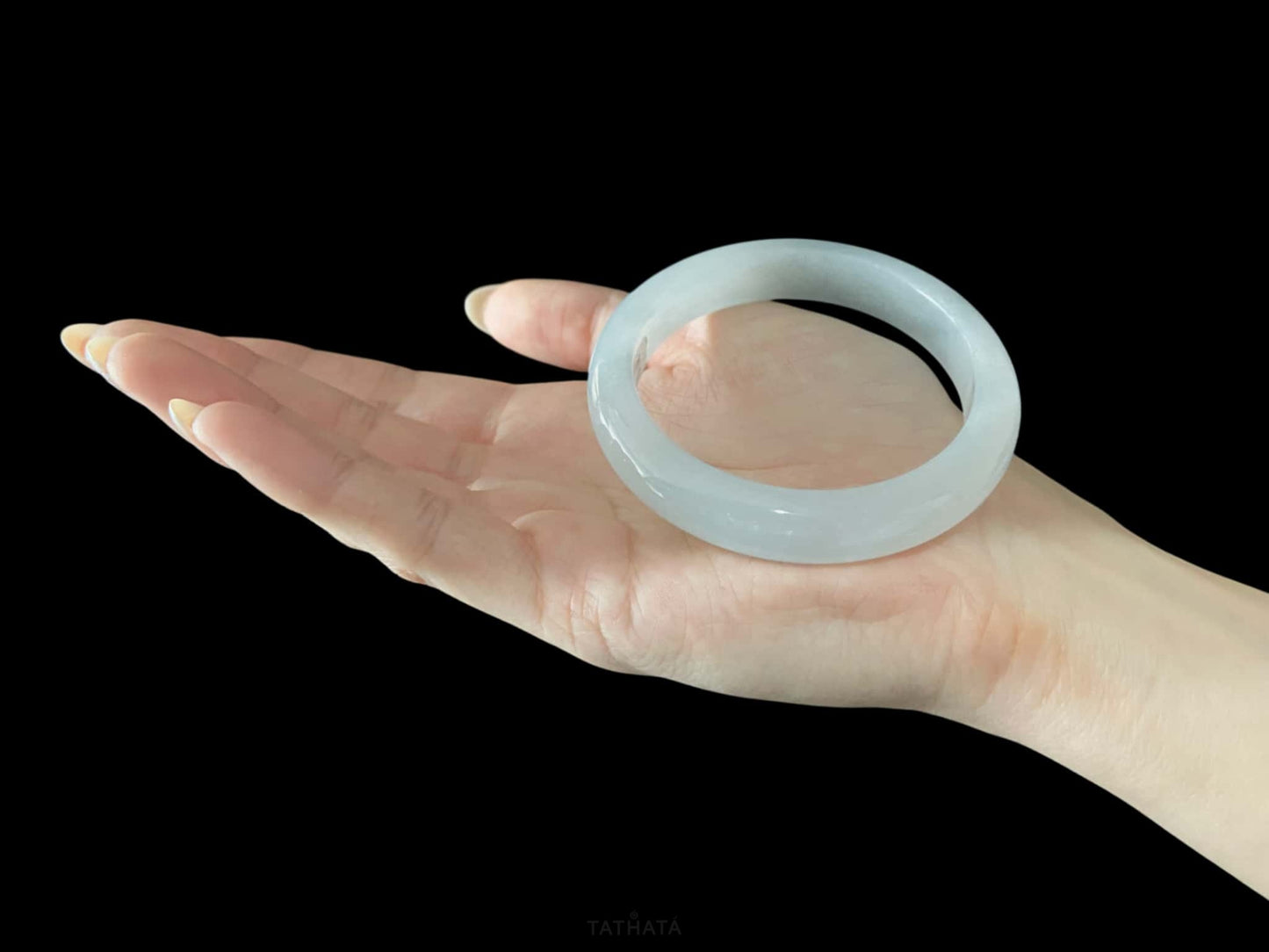 A milky white mist jadeite bangle.