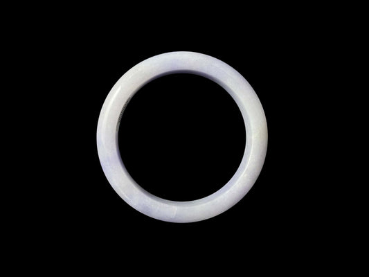 A purple mist shade jadeite bangle.