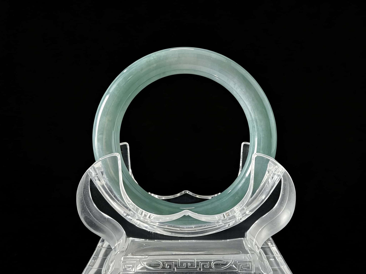 A heavenly blue mist jadeite bangle.