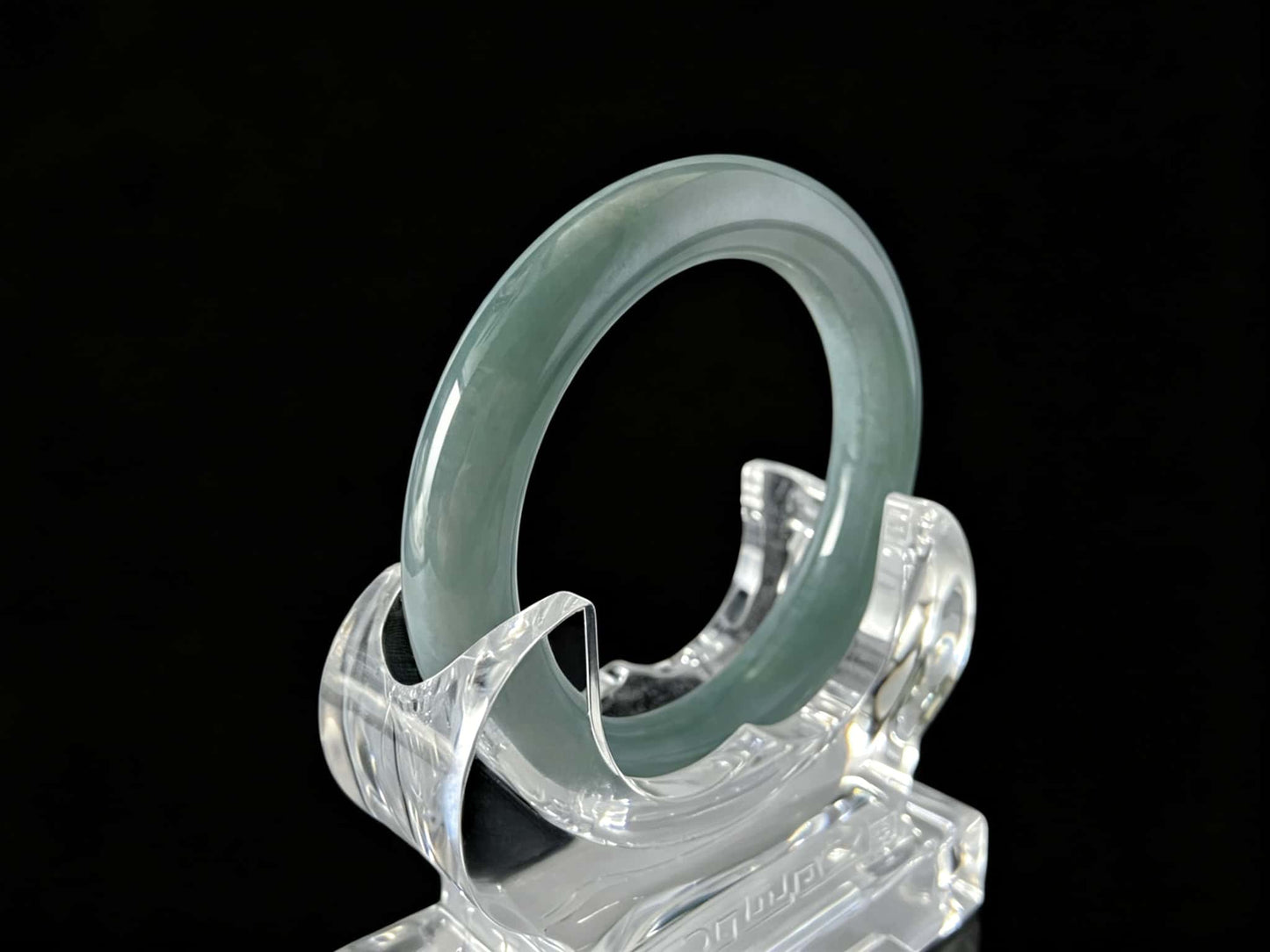 A heavenly blue mist jadeite bangle.