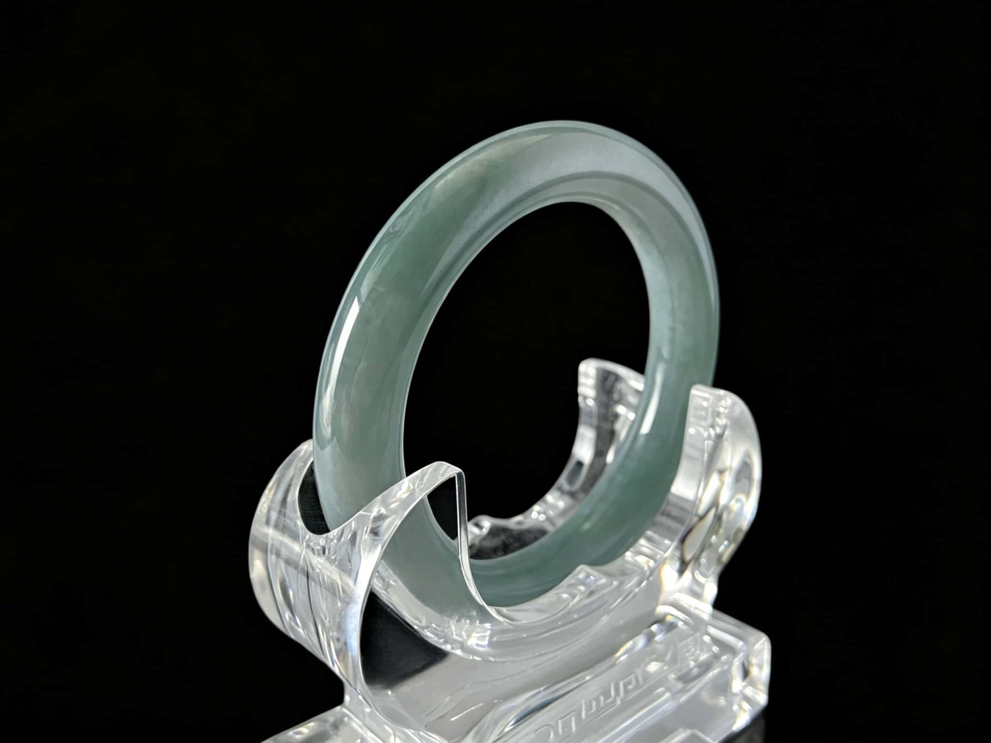 A heavenly blue mist jadeite bangle.