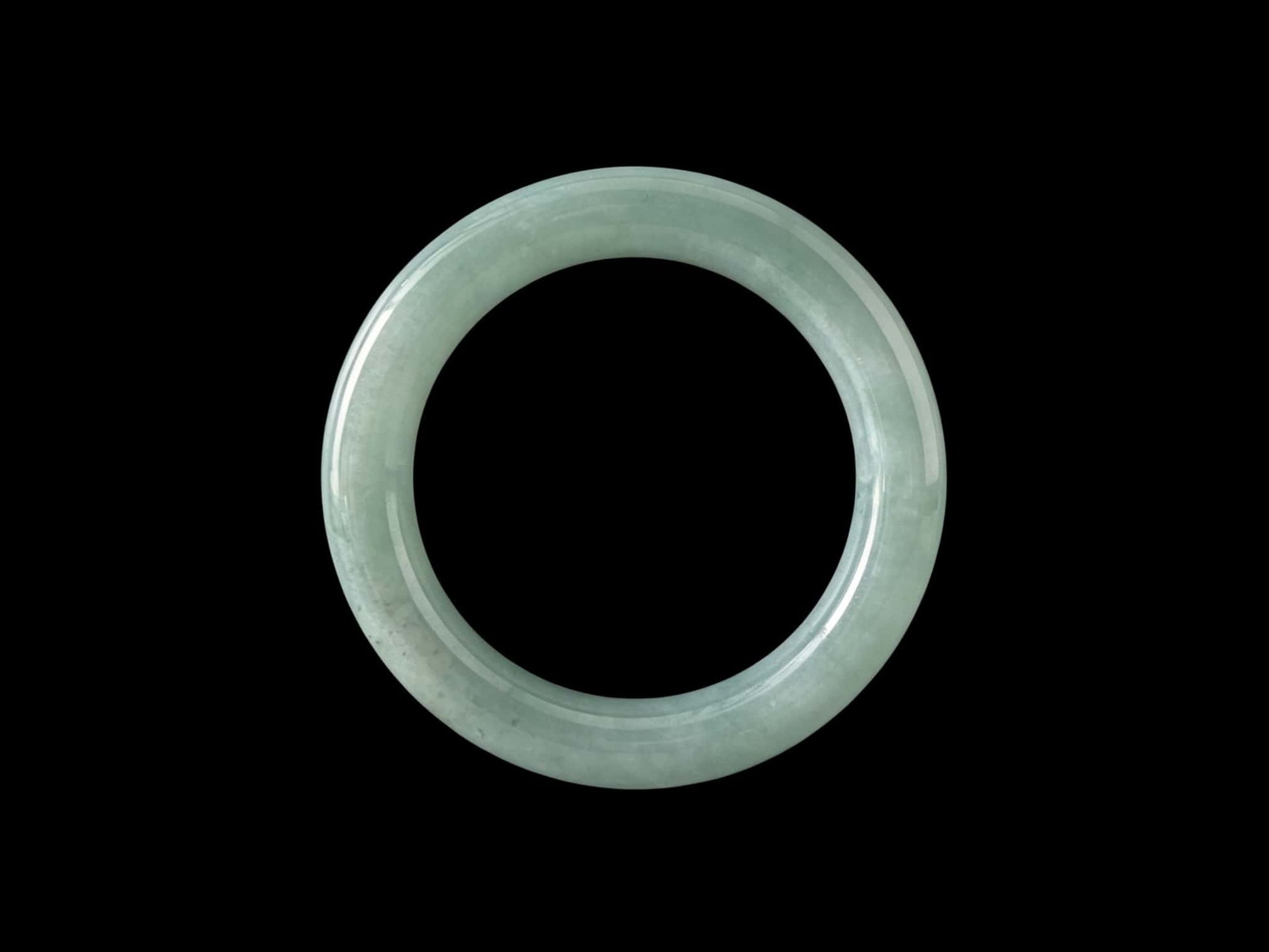 A heavenly blue mist jadeite bangle.