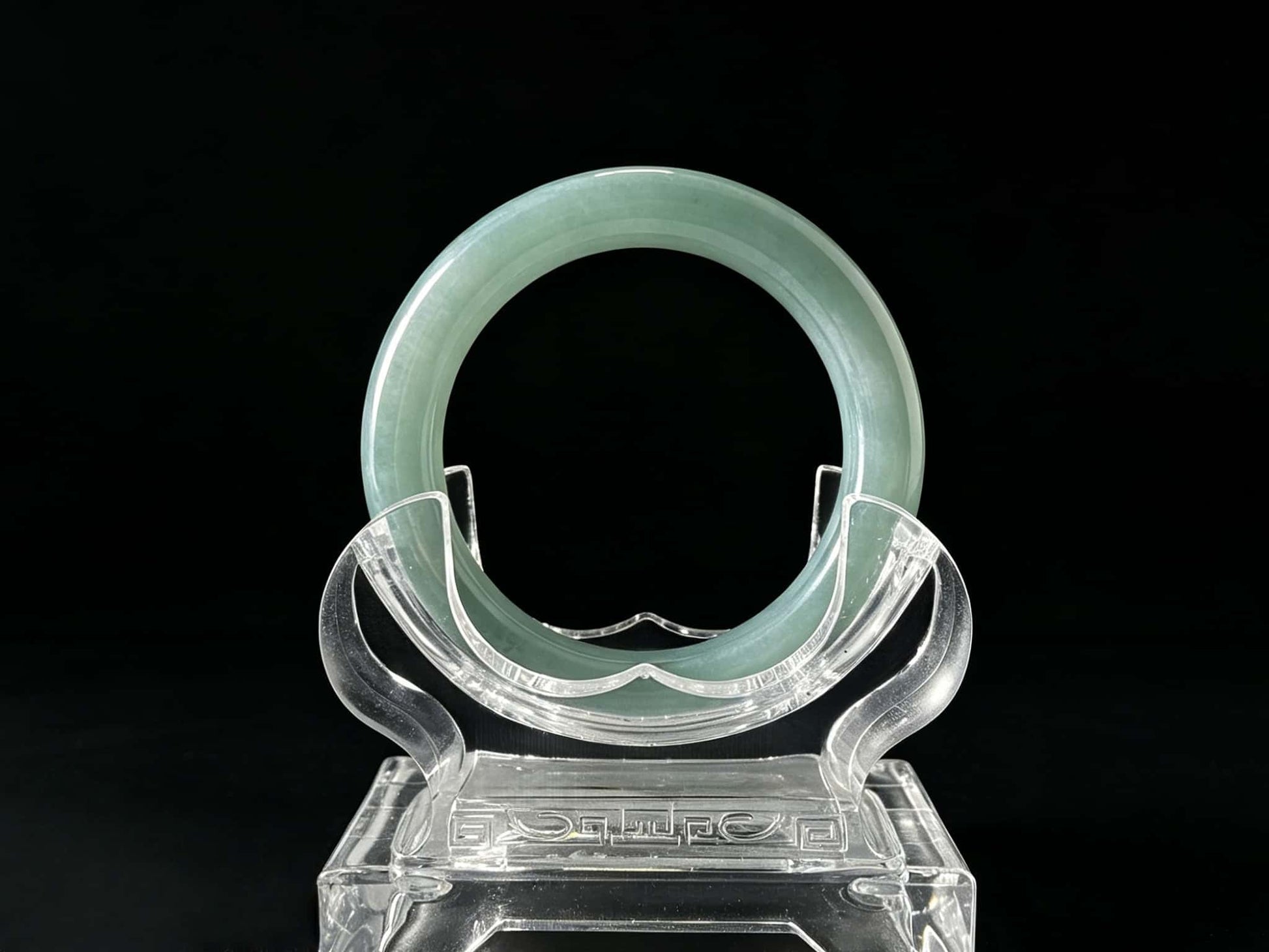 A heavenly blue mist jadeite bangle.