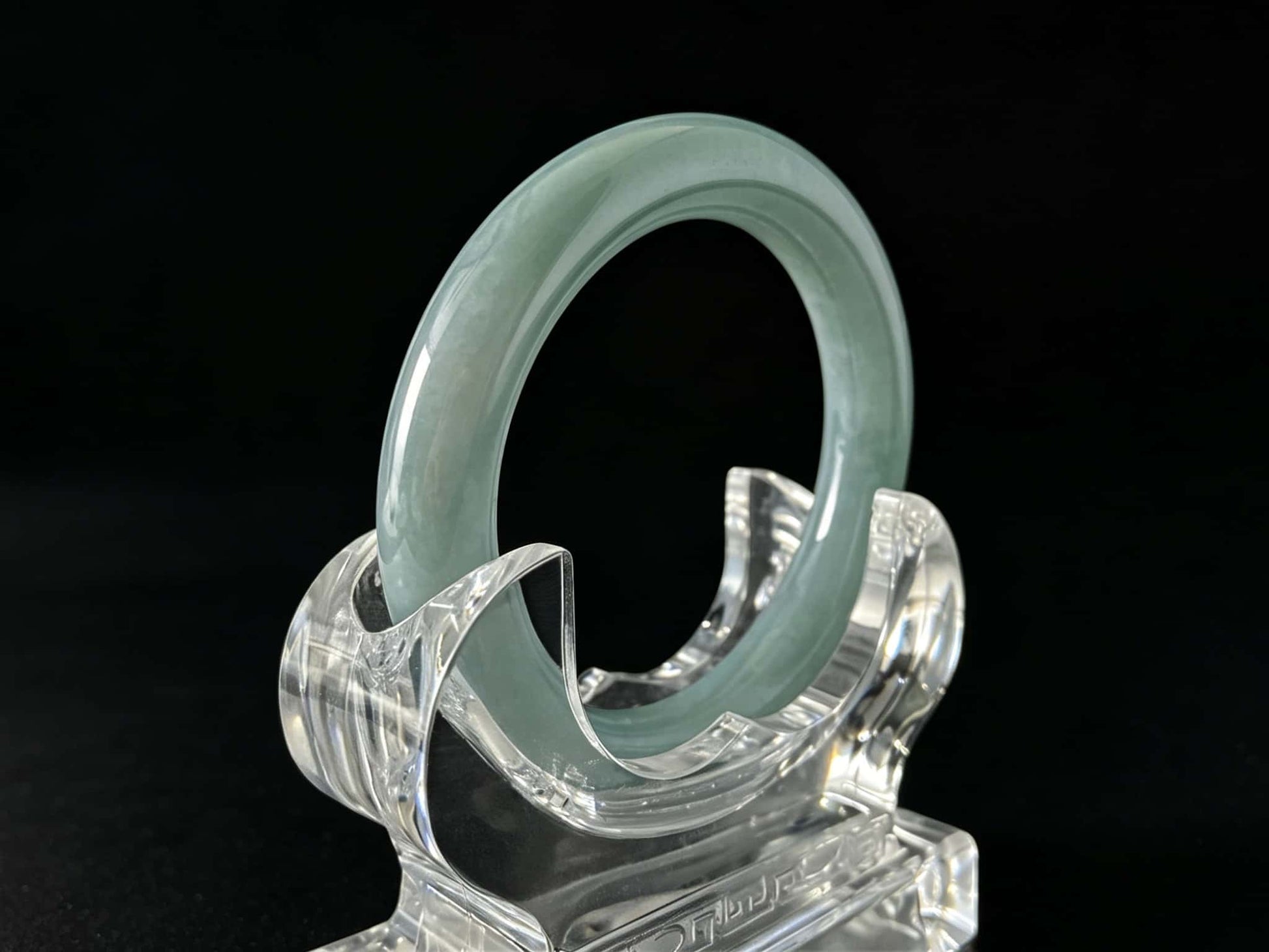 A heavenly blue mist jadeite bangle.