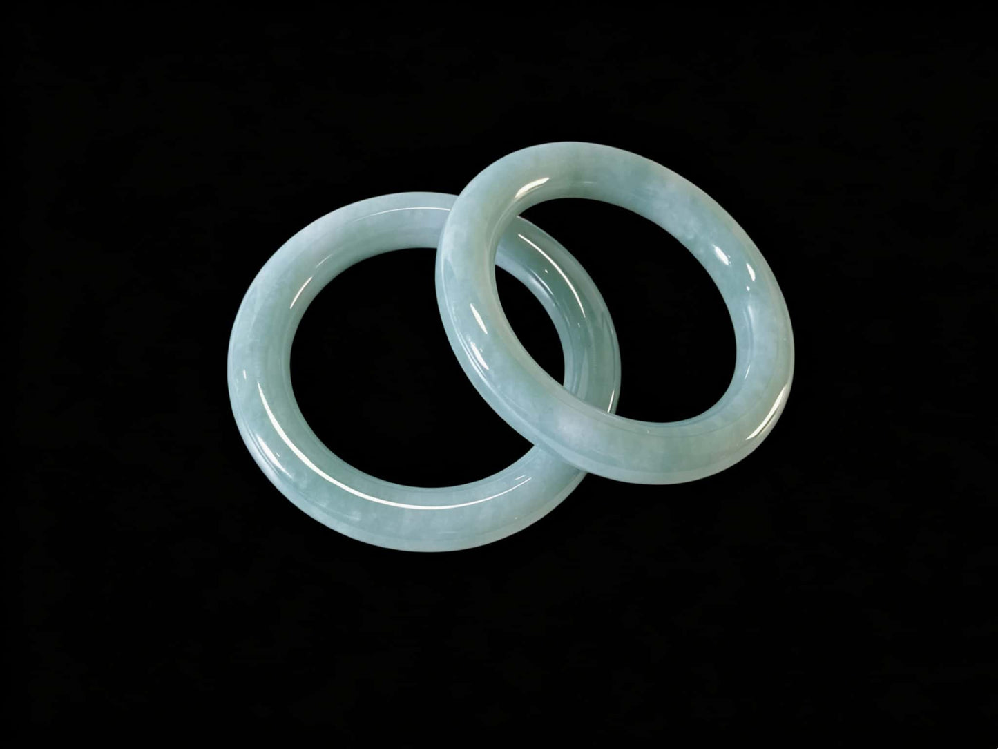 A misty blue dew jadeite bangle.