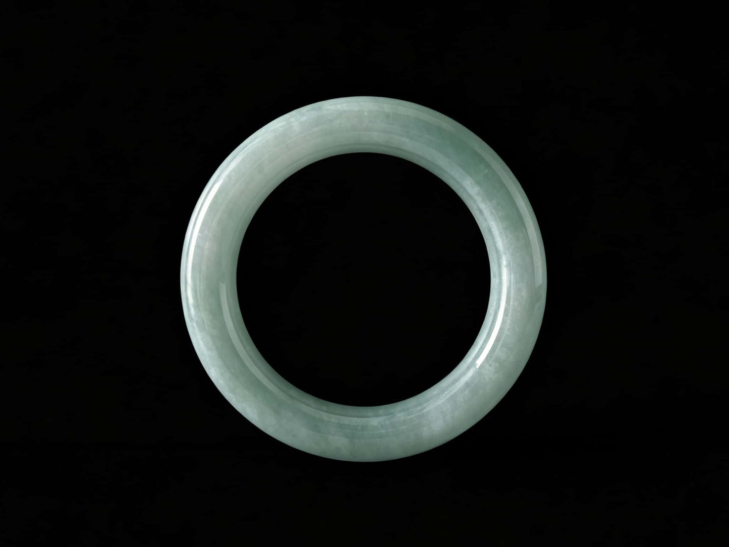 A misty blue dew jadeite bangle.