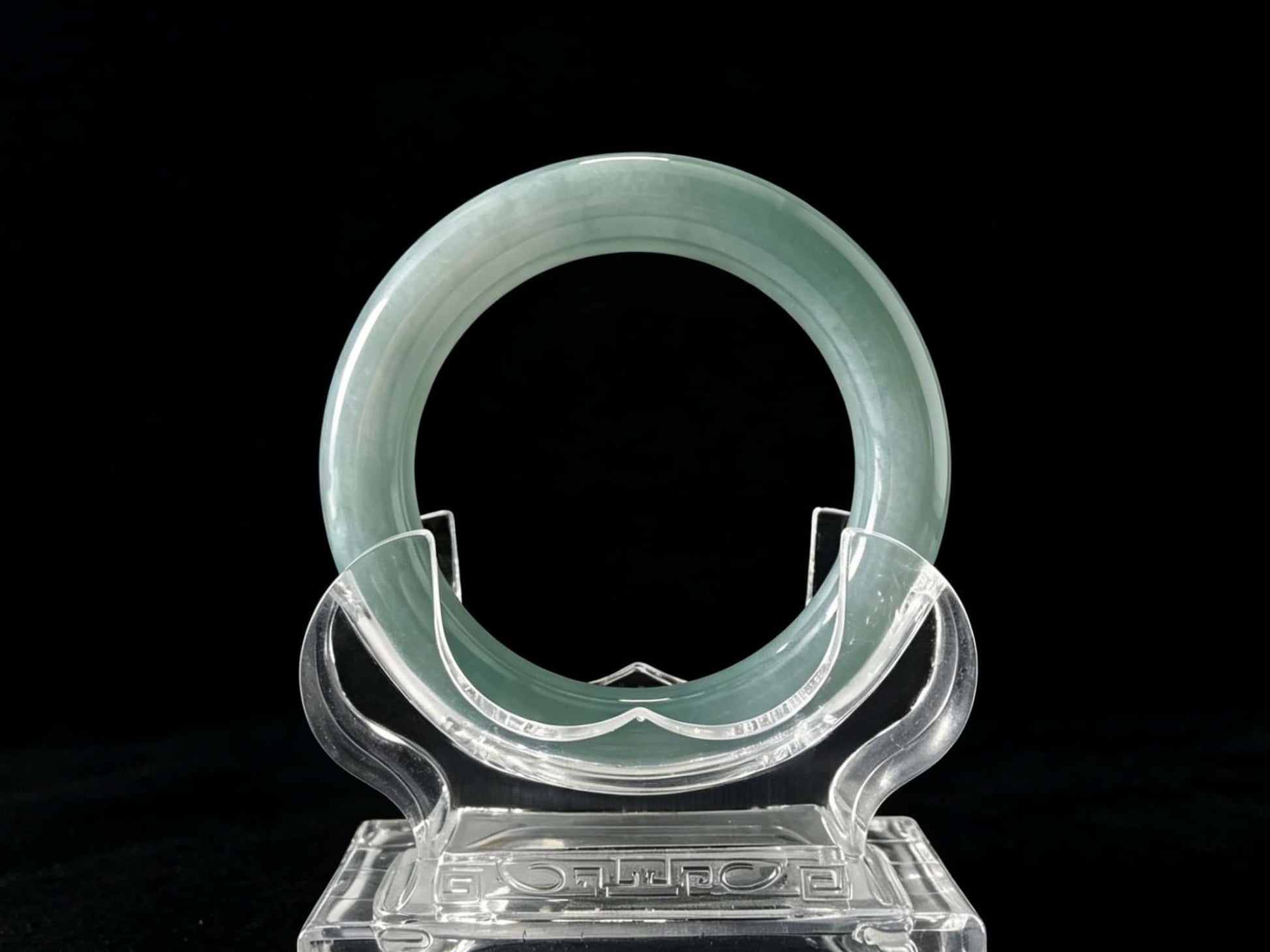 A misty blue dew jadeite bangle.