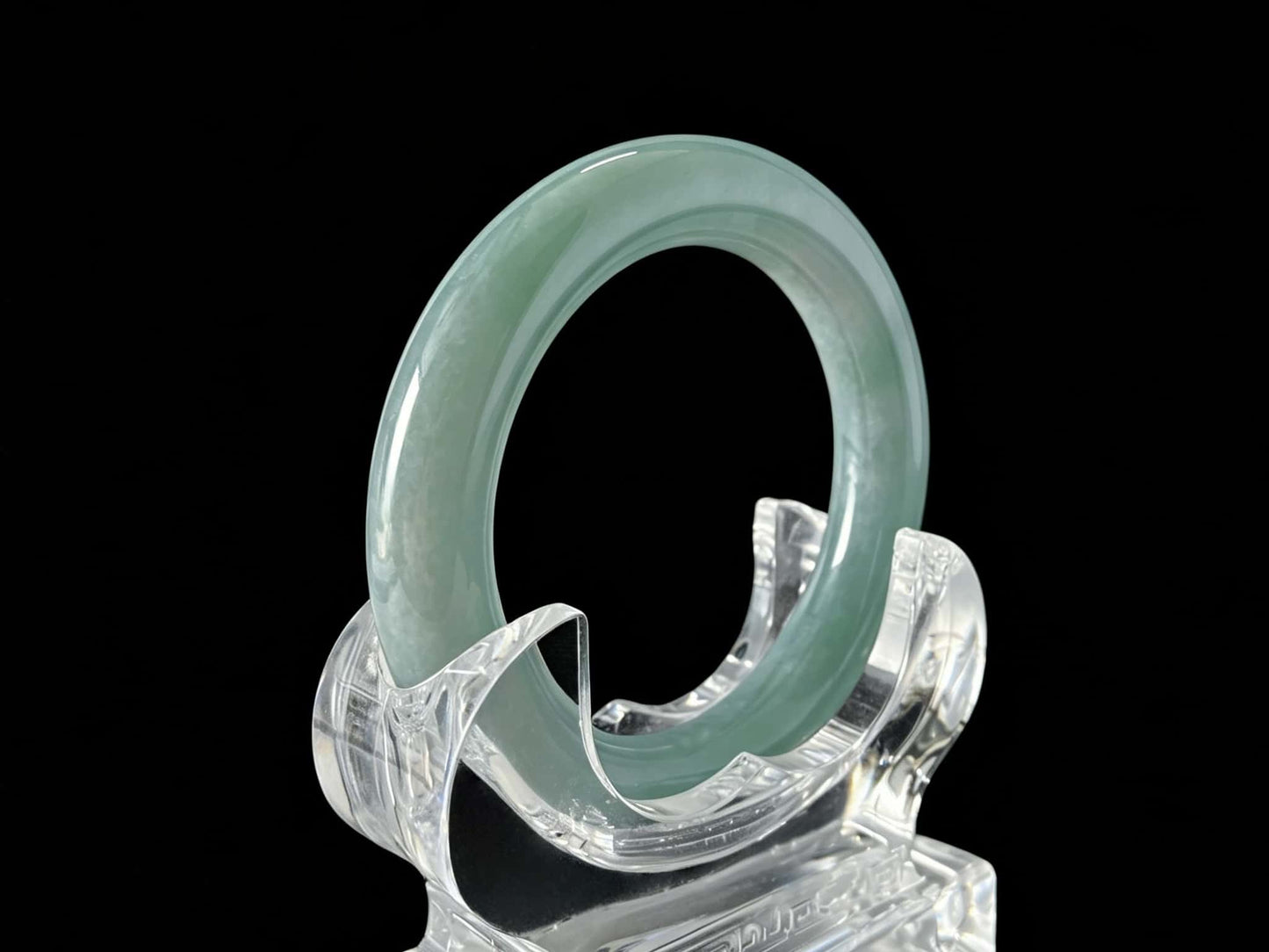 A misty blue dew jadeite bangle.
