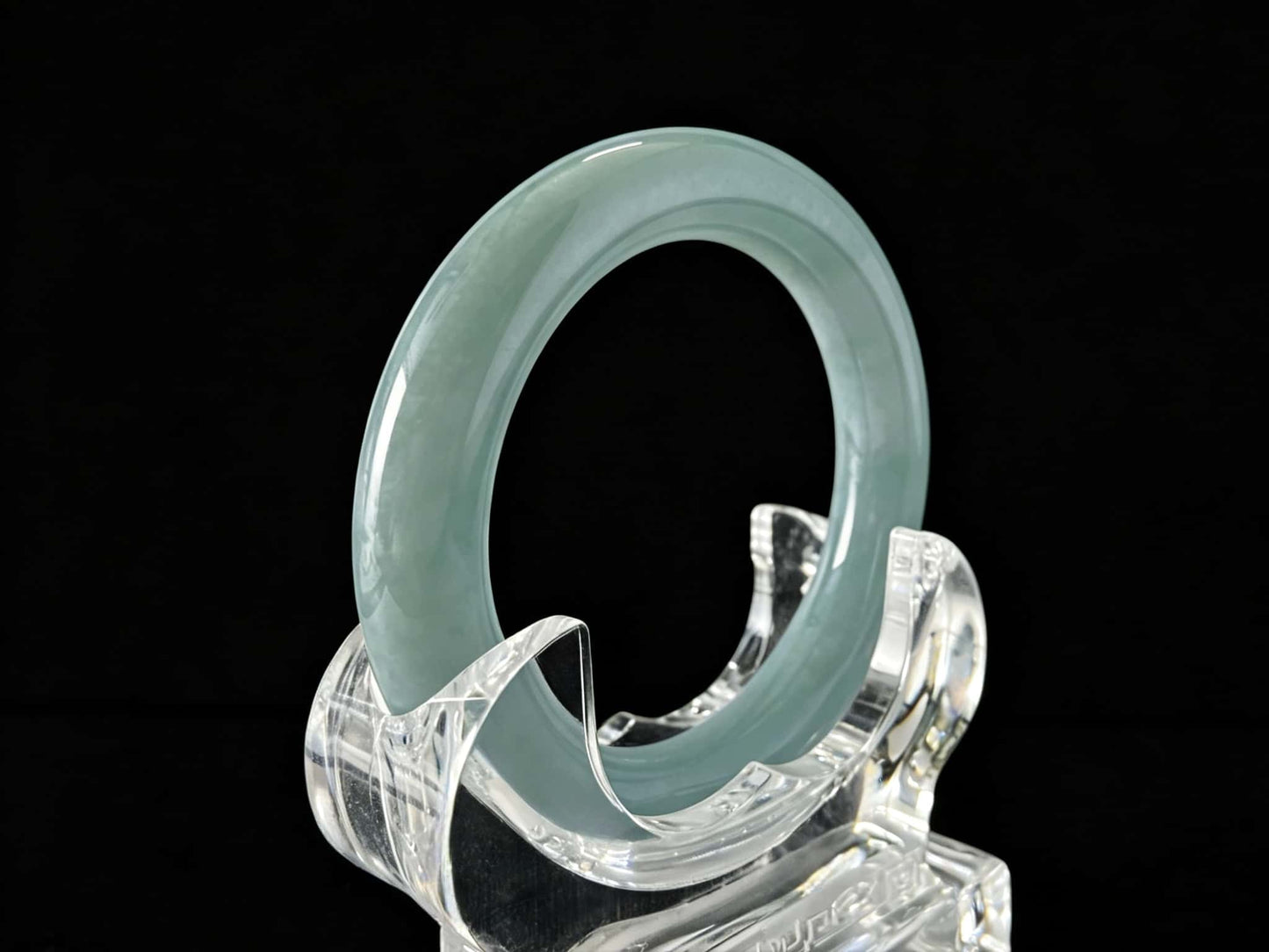 A misty blue dew jadeite bangle.