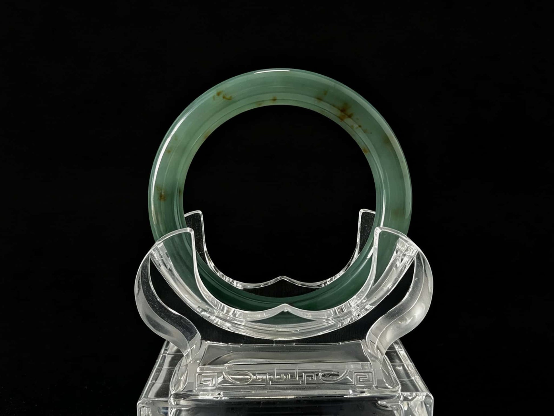 A honey green mist jadeite bangle.