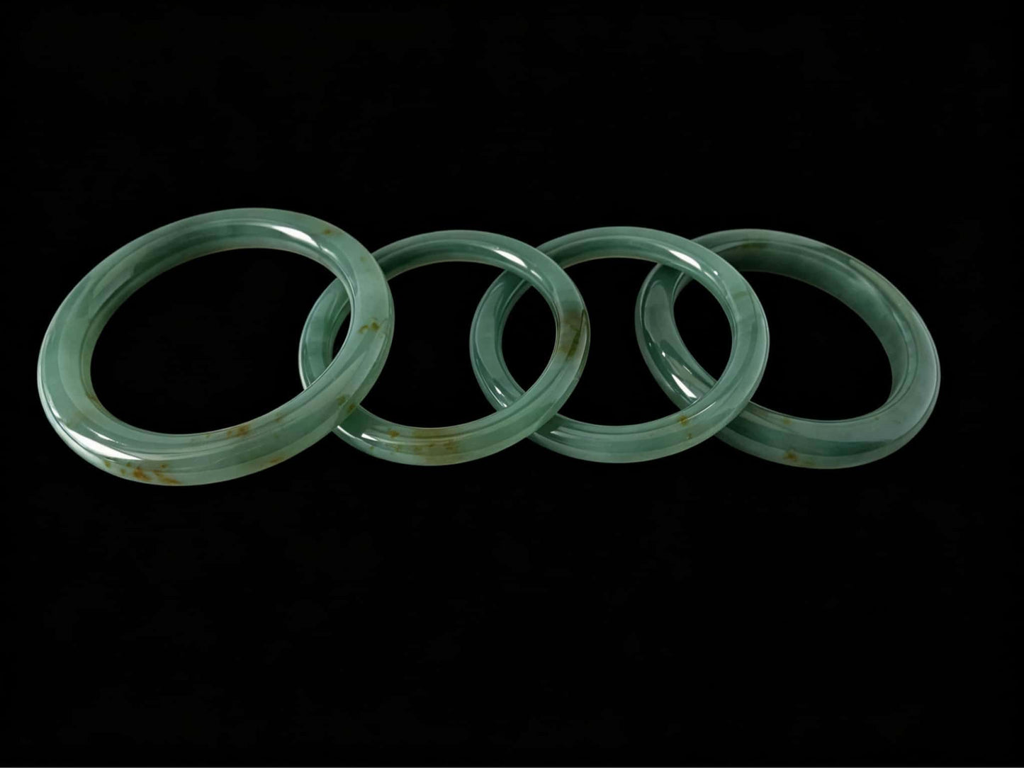 A honey green mist jadeite bangle.