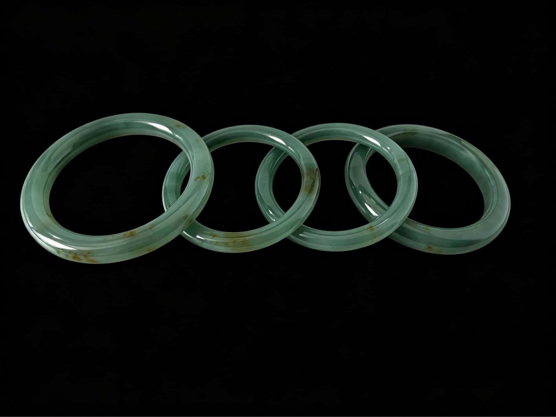 A honey green mist jadeite bangle.
