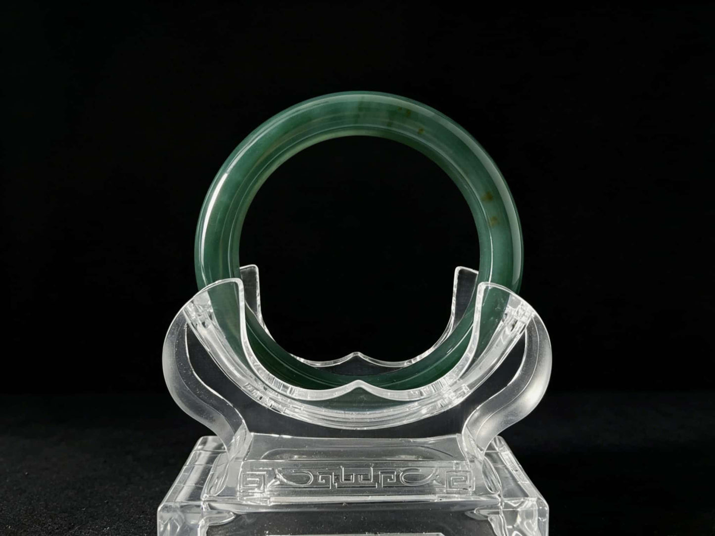A honey green mist jadeite bangle.