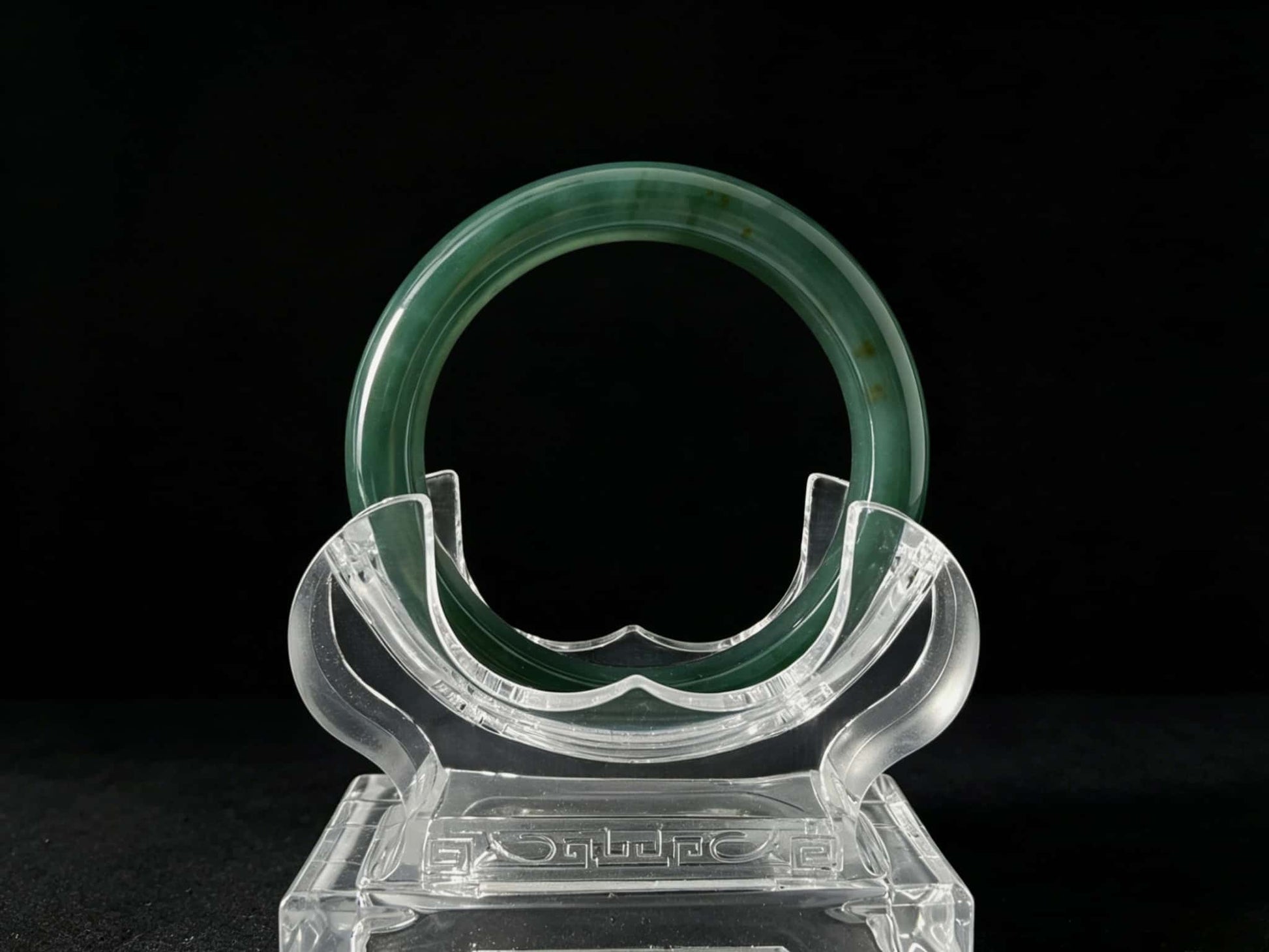A honey green mist jadeite bangle.