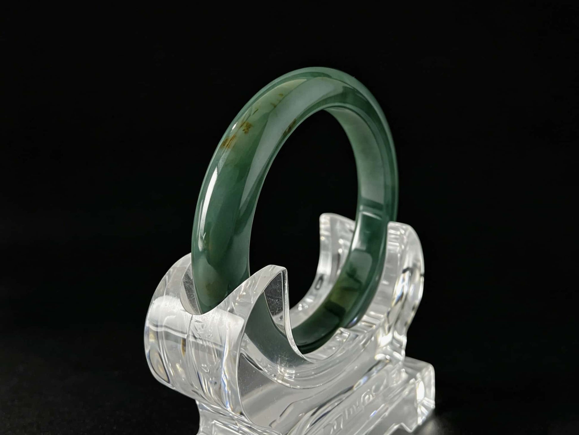 A honey green mist jadeite bangle.