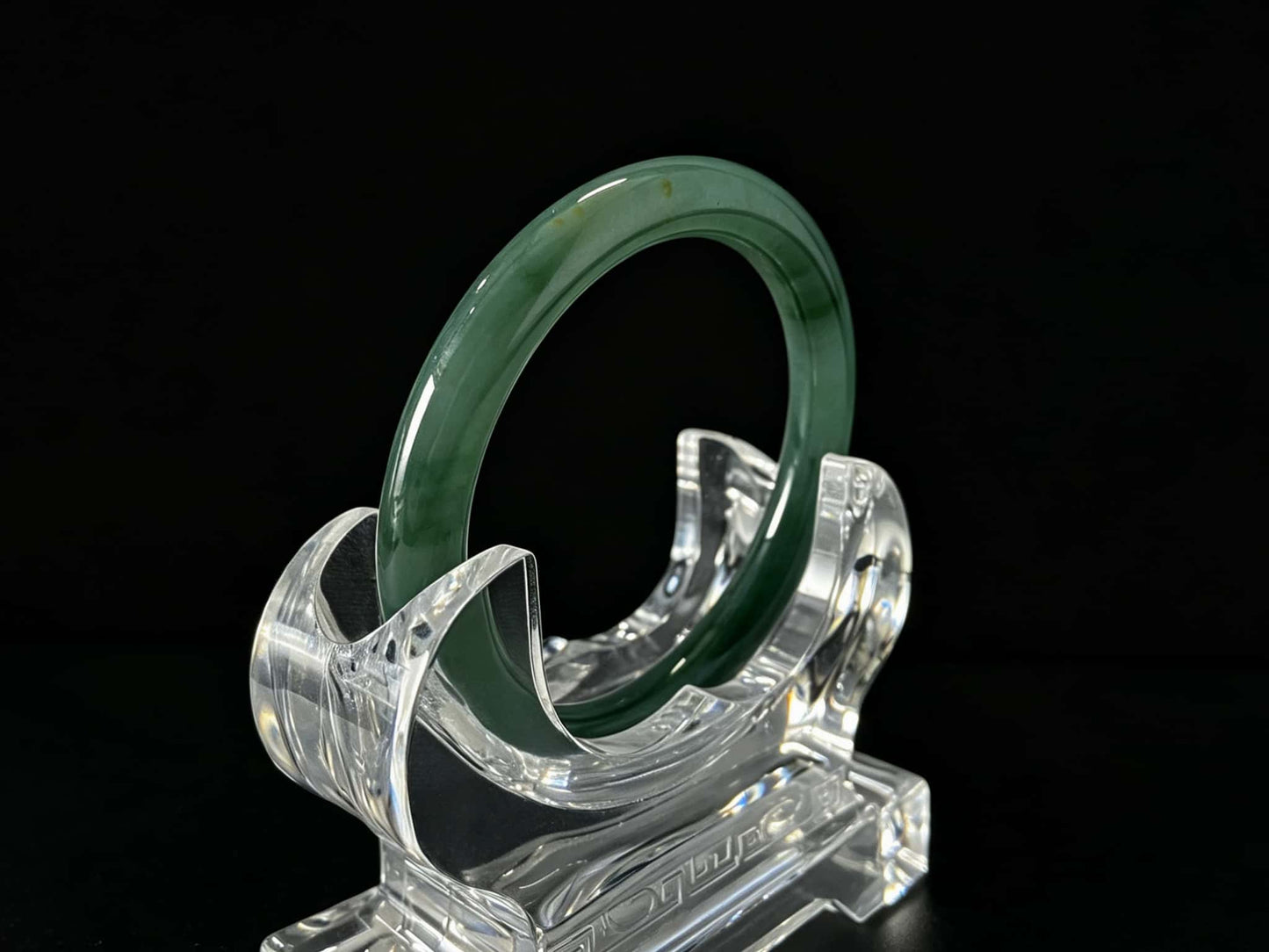 A honey green mist jadeite bangle.