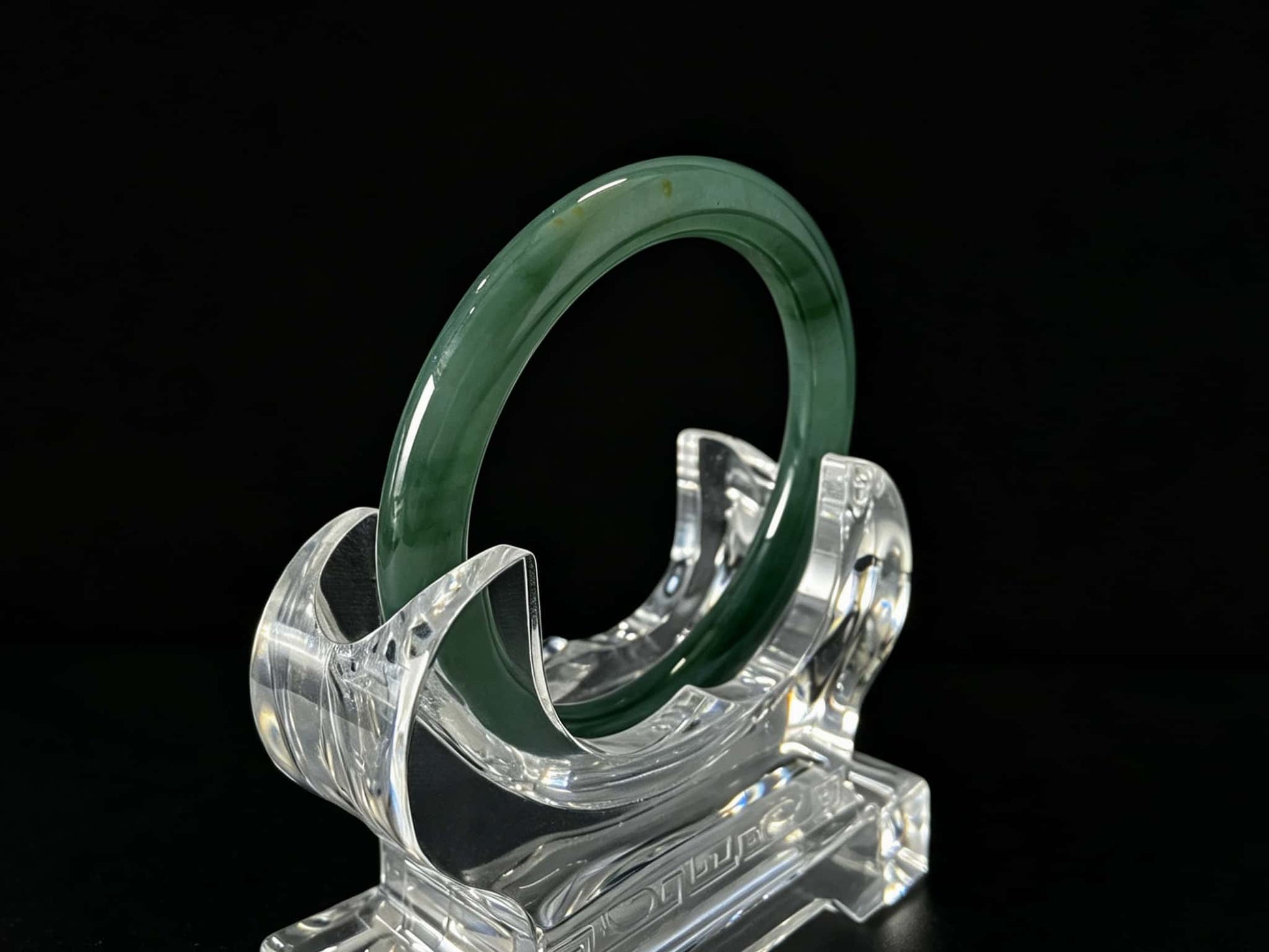 A honey green mist jadeite bangle.
