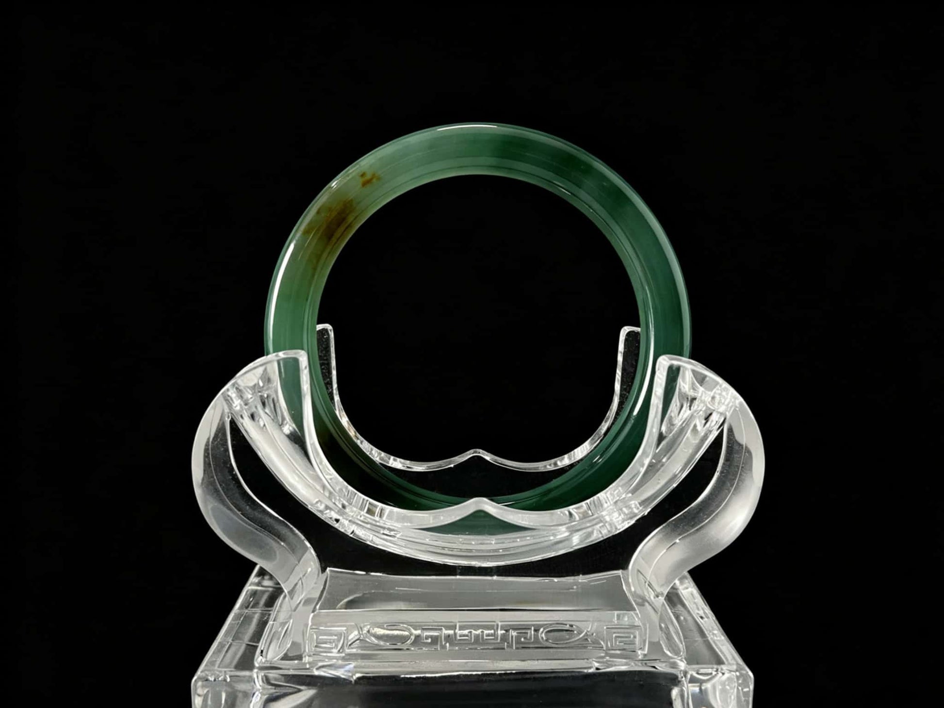 A honey green mist jadeite bangle.