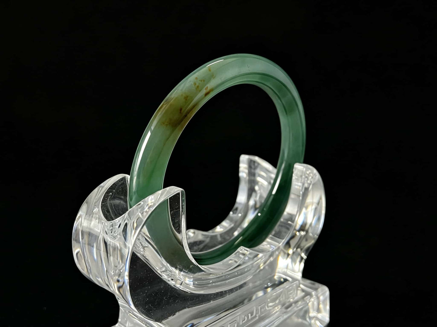 A honey green mist jadeite bangle.