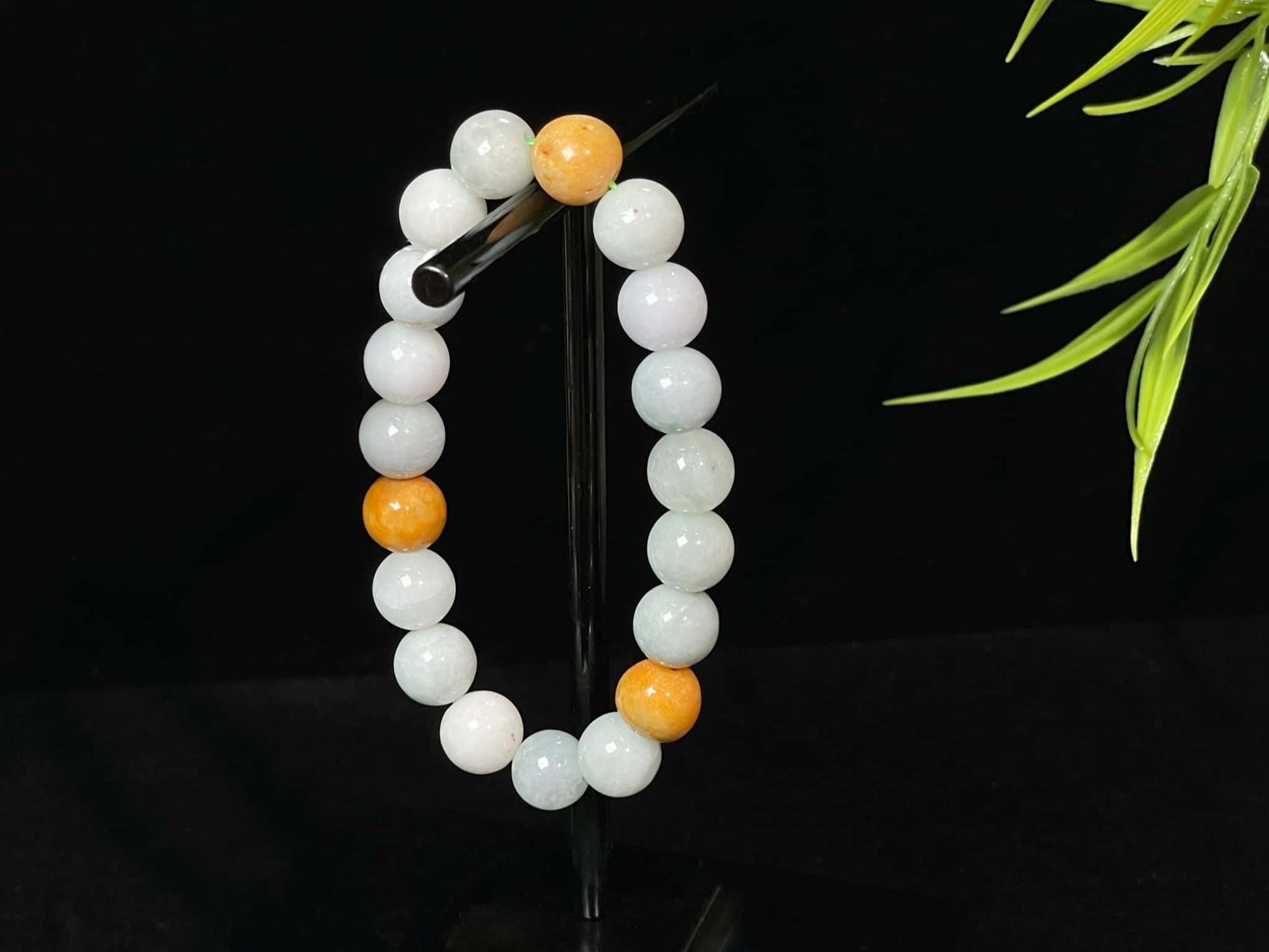 A four hues harmony jadeite beads bracelet.