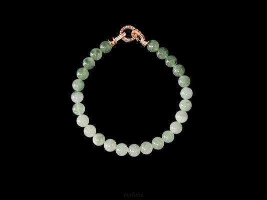 A floating green gradient jadeite beads bracelet.