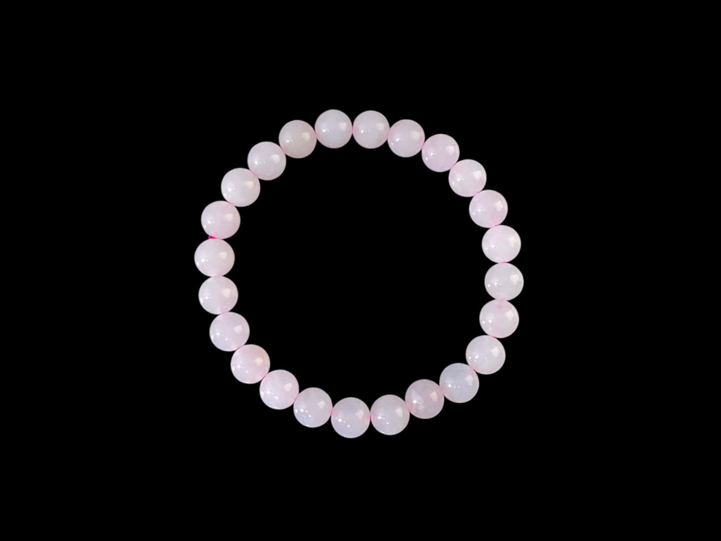 A clear white with pink thread jadeite beads bracelet.