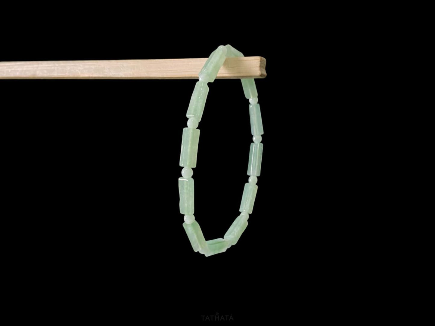 A mist green column jadeite beads bracelet.