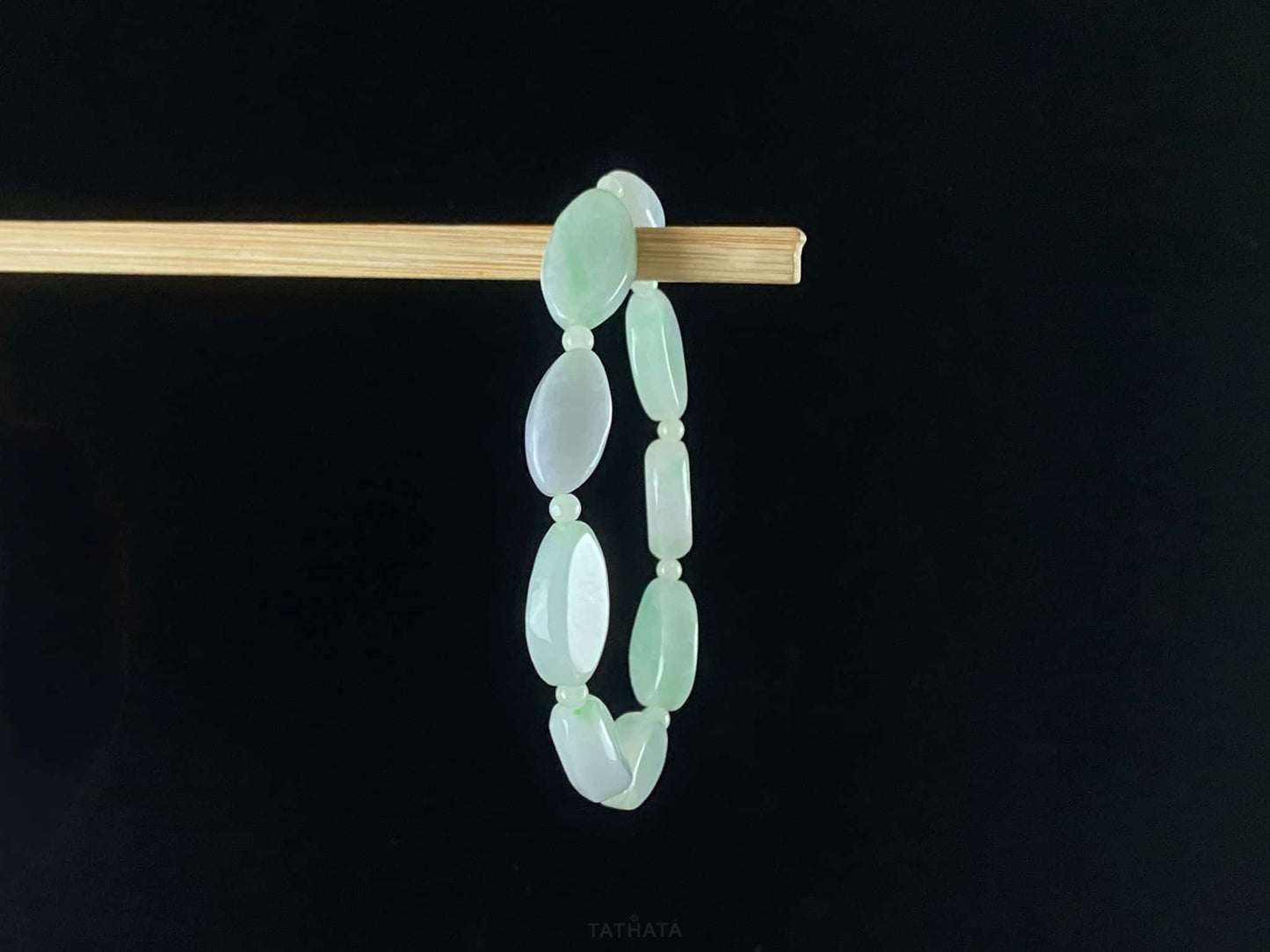 A soft mint cval jadeite beads bracelet.