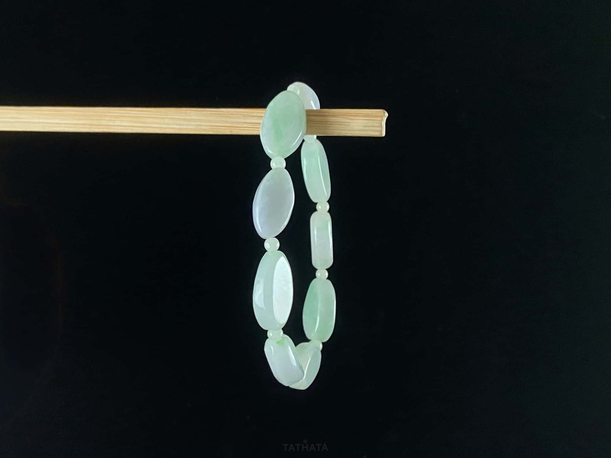 A soft mint cval jadeite beads bracelet.