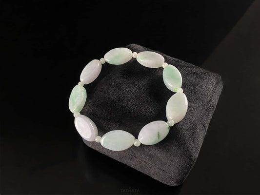 A soft mint cval jadeite beads bracelet.