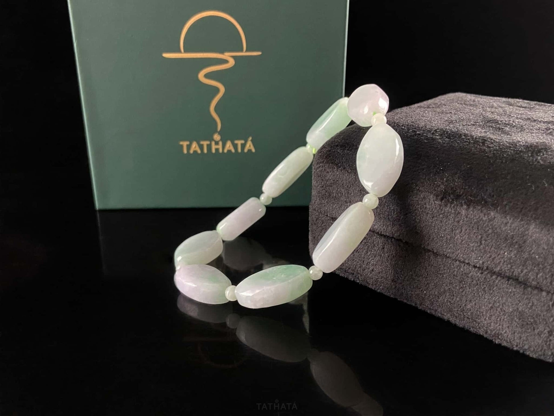 A soft mint cval jadeite beads bracelet.