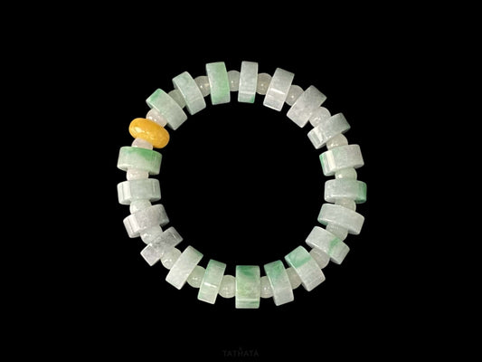 A cylinder mint yellow slice jadeite beads bracelet.