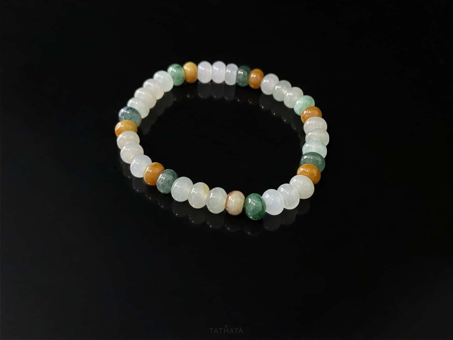 A misty seasonal tones jadeite beads bracelet.