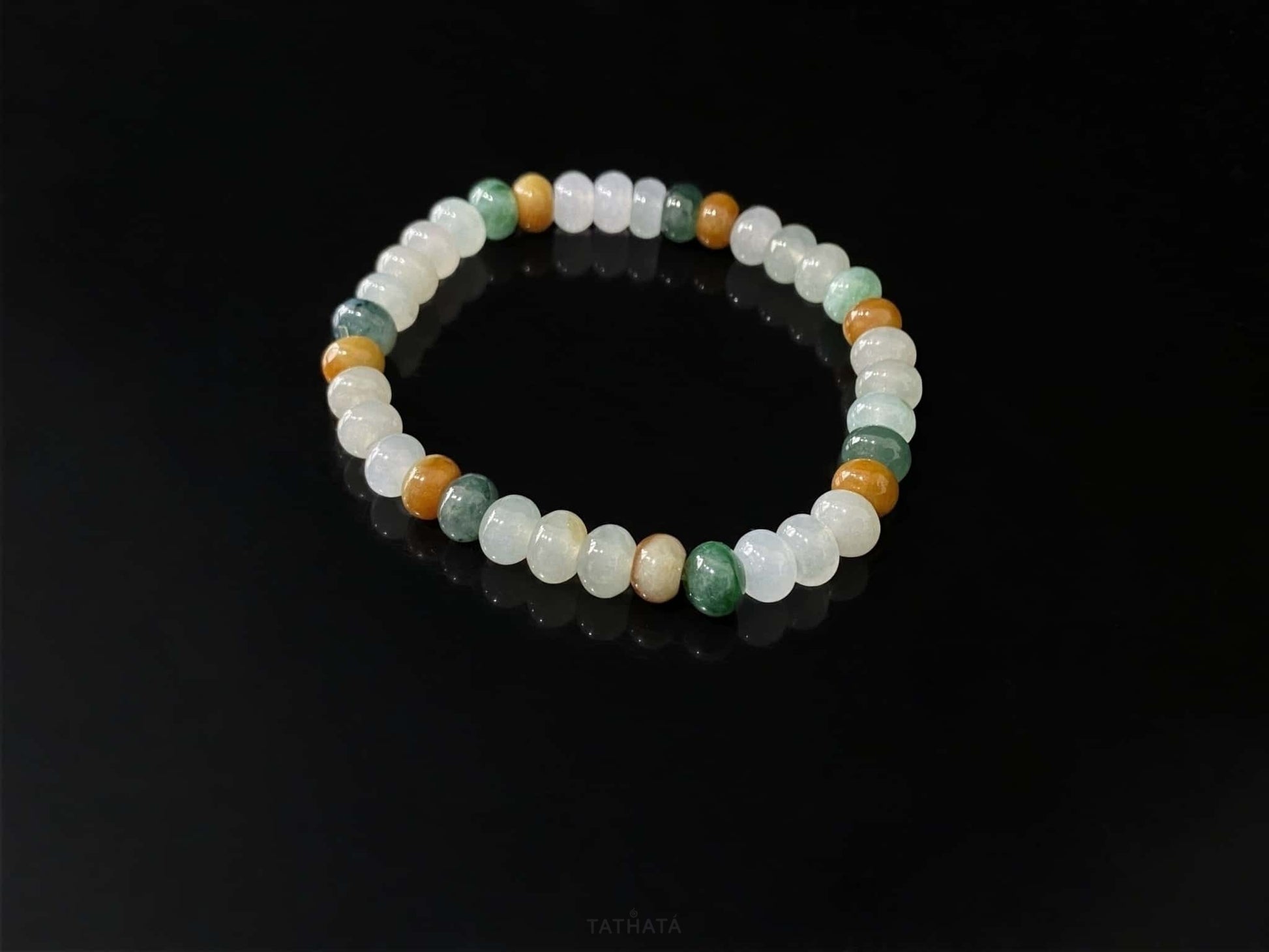 A misty seasonal tones jadeite beads bracelet.