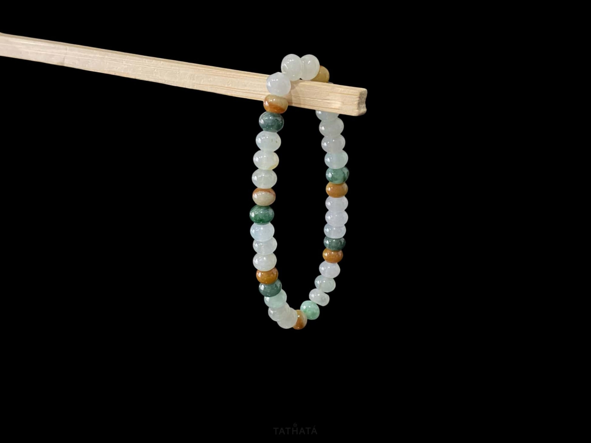 A misty seasonal tones jadeite beads bracelet.