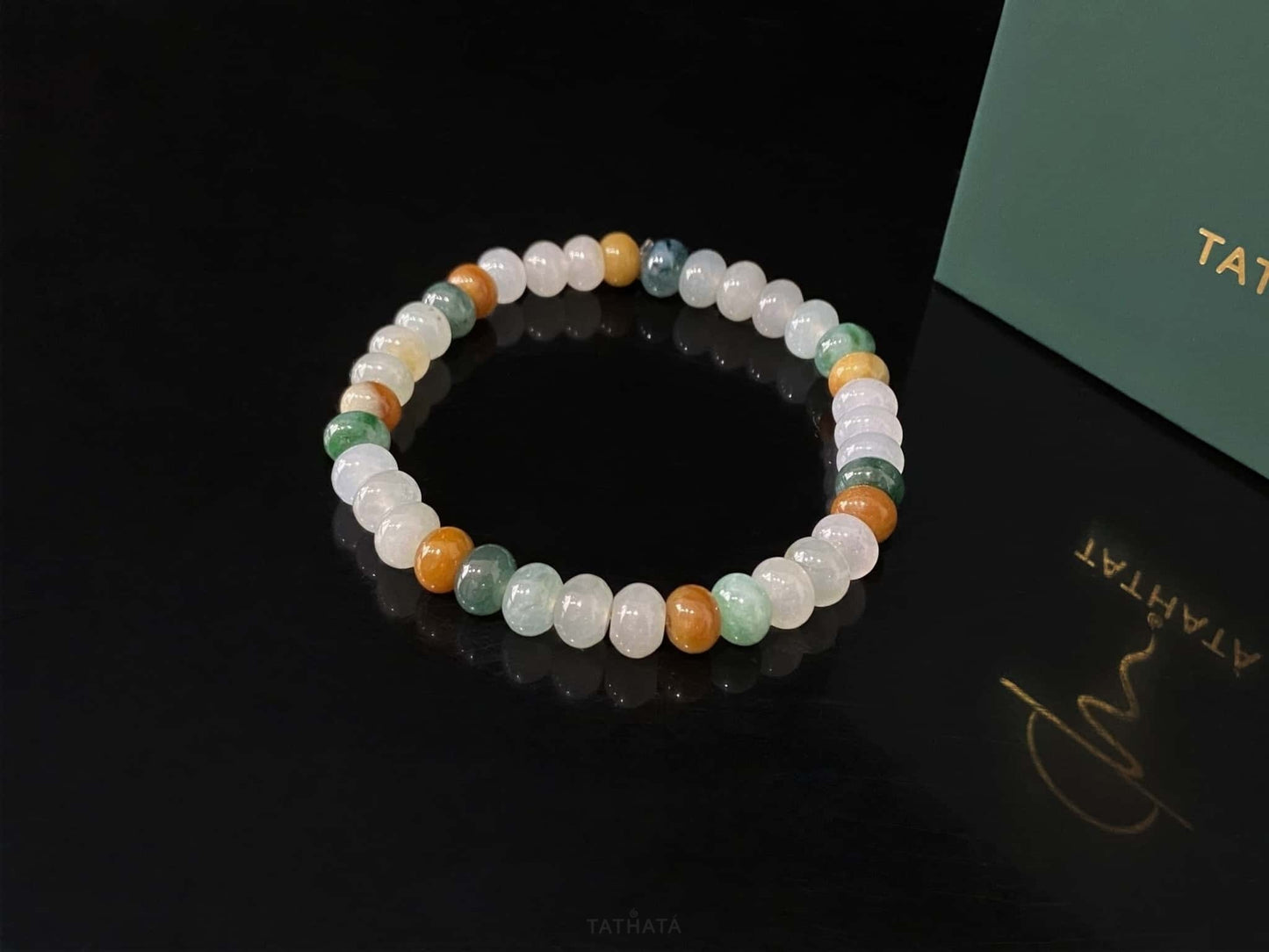 A misty seasonal tones jadeite beads bracelet.