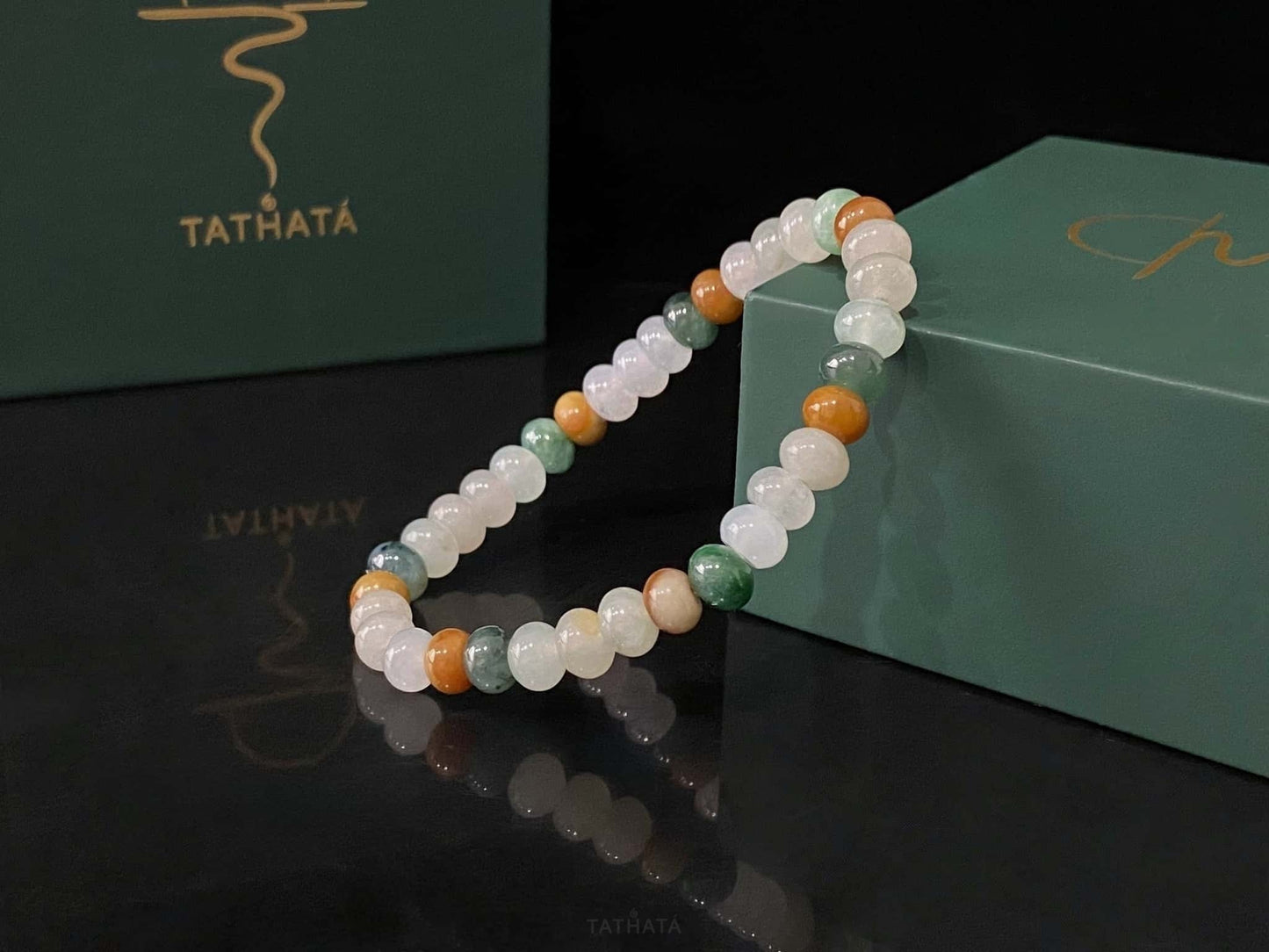 A misty seasonal tones jadeite beads bracelet.