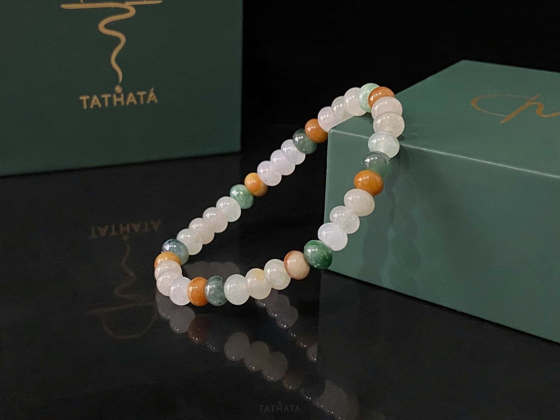 A misty seasonal tones jadeite beads bracelet.