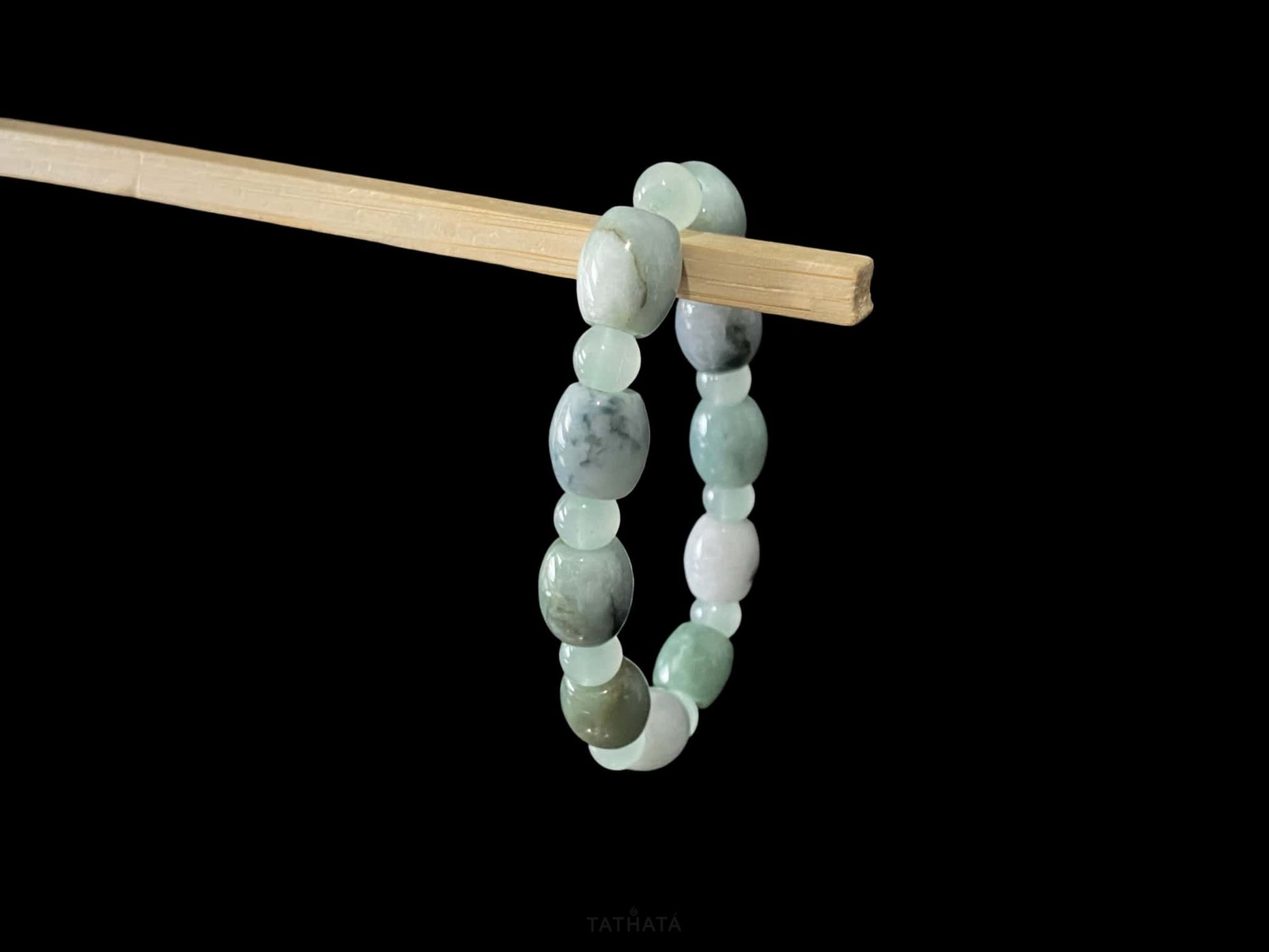 A floating mist barrel jadeite beads bracelet.