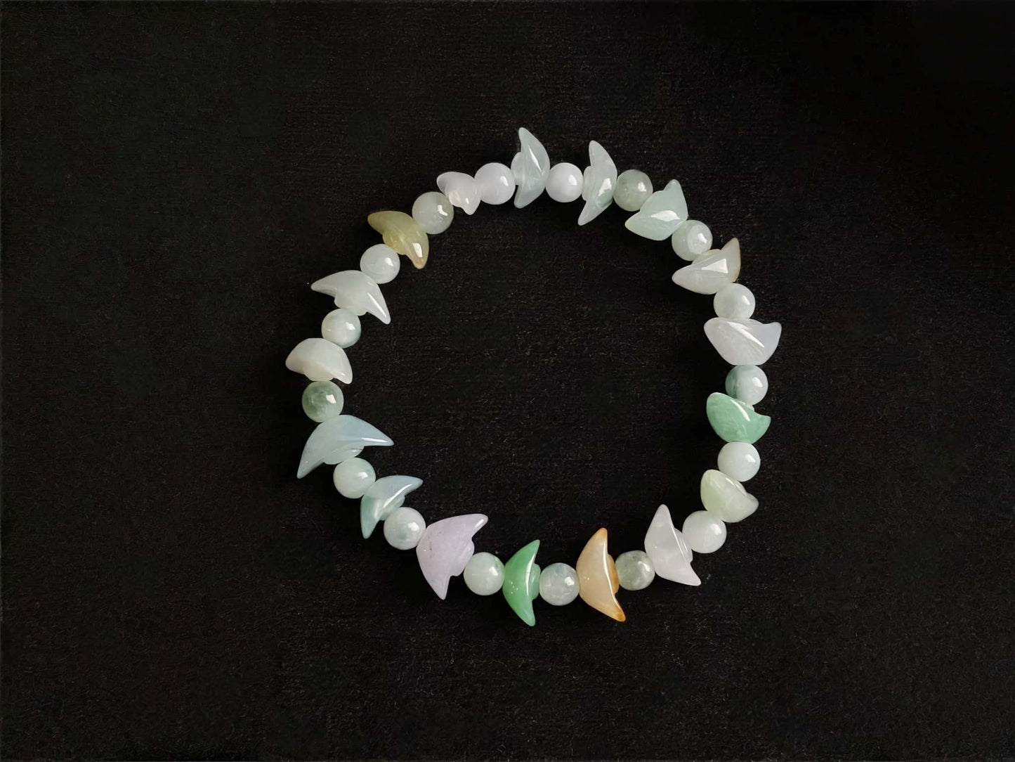 A multicolor wealth Yuanbao jadeite beads bracelet.