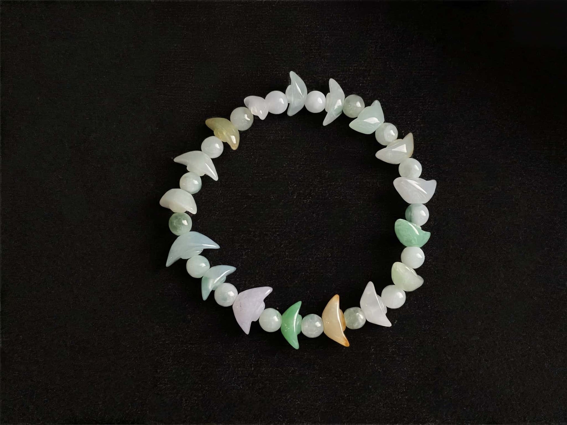 A multicolor wealth Yuanbao jadeite beads bracelet.