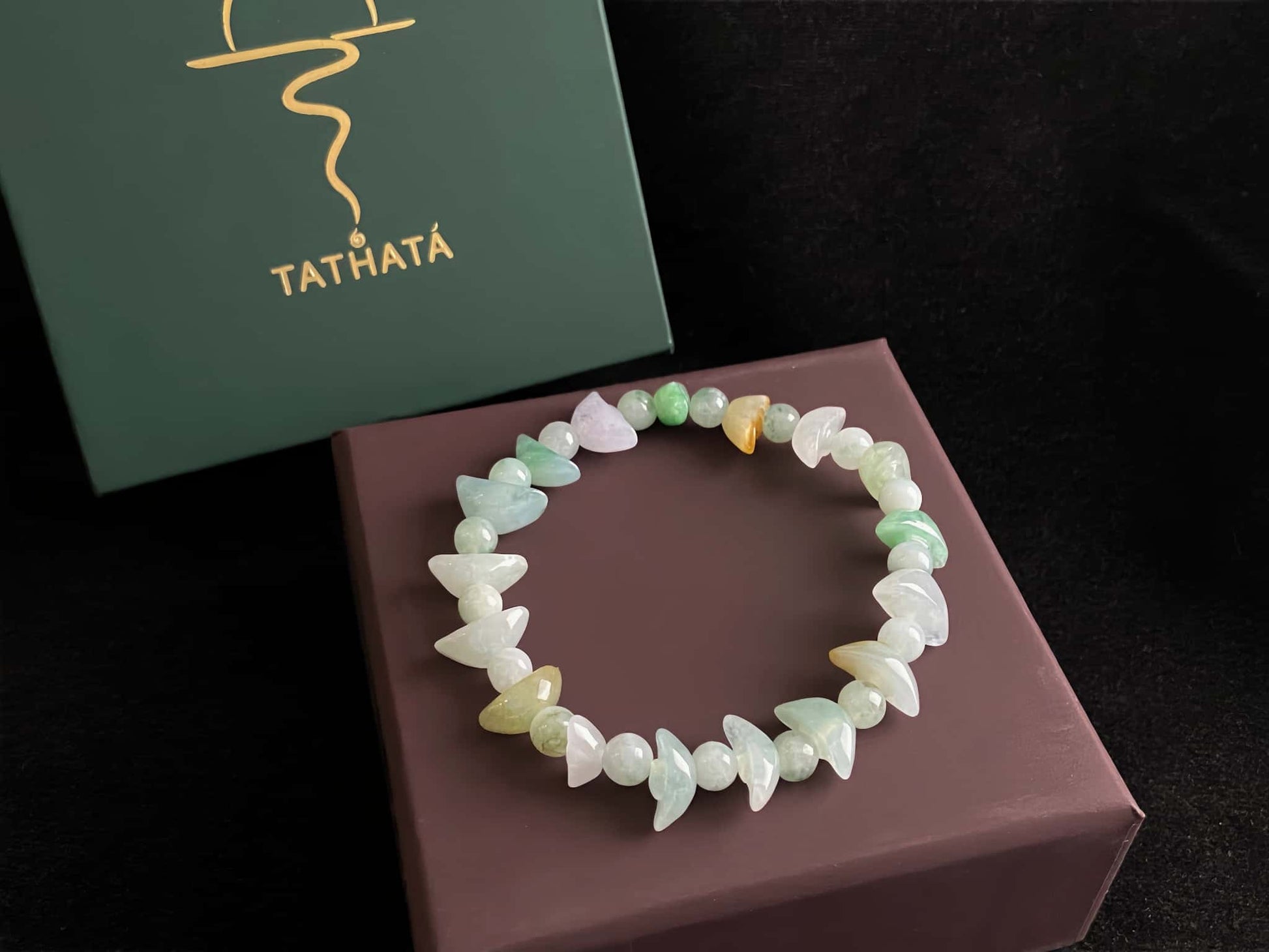 A multicolor wealth Yuanbao jadeite beads bracelet.