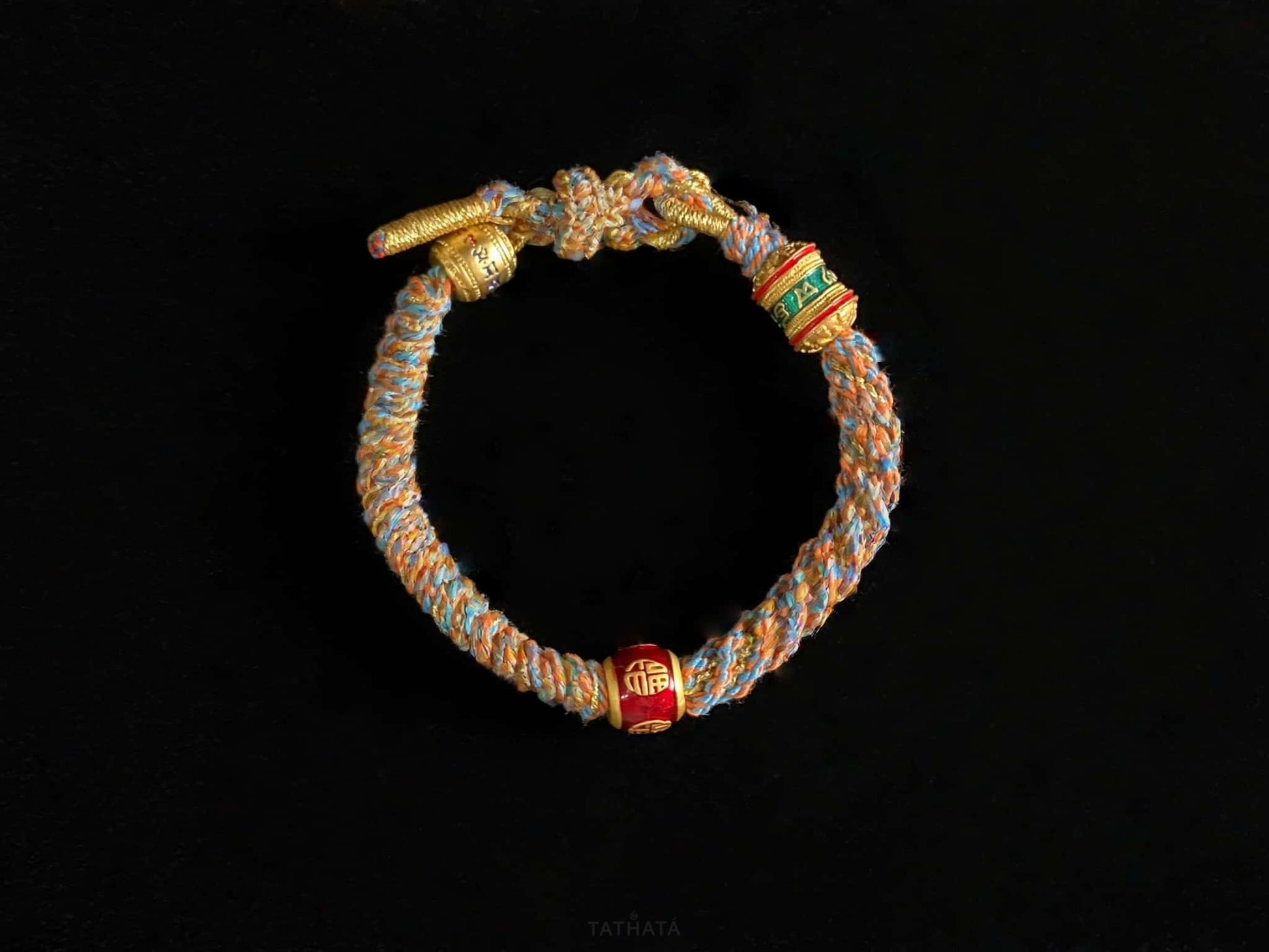 A mantra fortune woven tibetan bracelet.